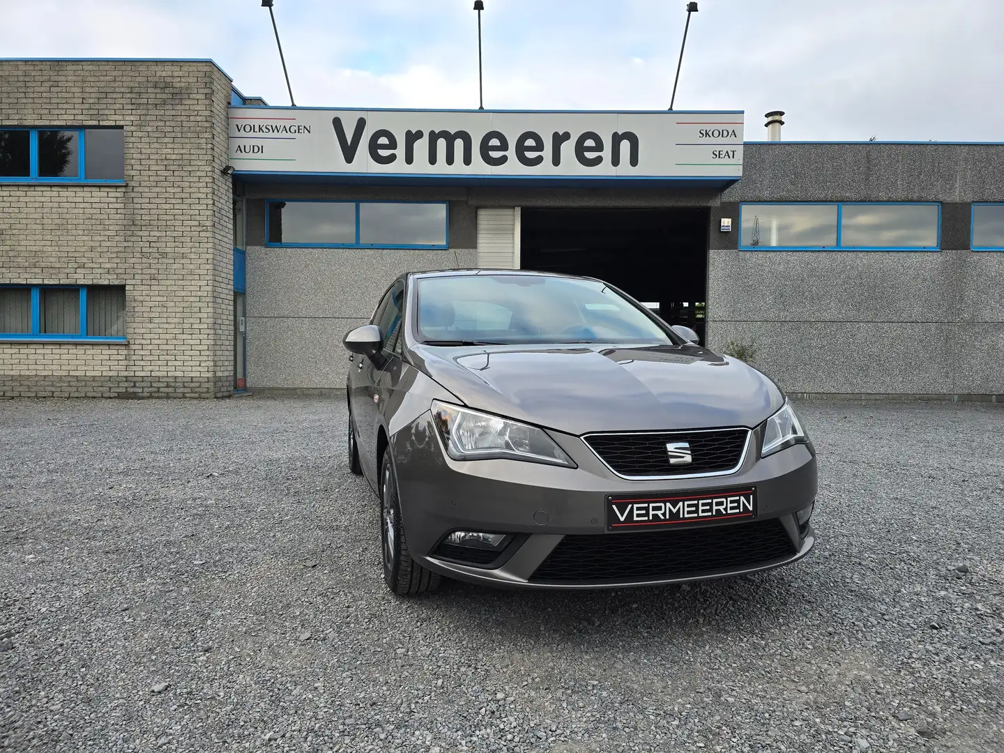 SEAT Ibiza 1.0 TSI Style / Airco / Navi / Parkpilot / Carplay Grijs - 1