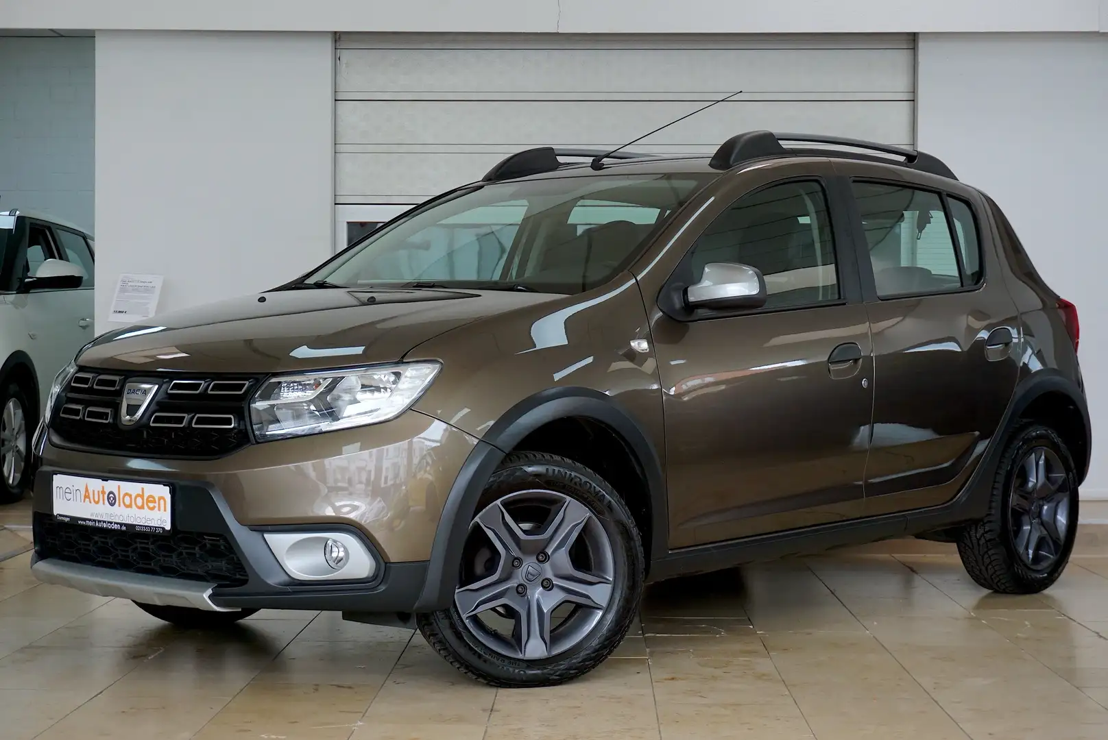 Dacia Sandero Stepway Prestige Autom. *NAVI*KAMERA*PDC*TEMPOMAT* Braun - 1