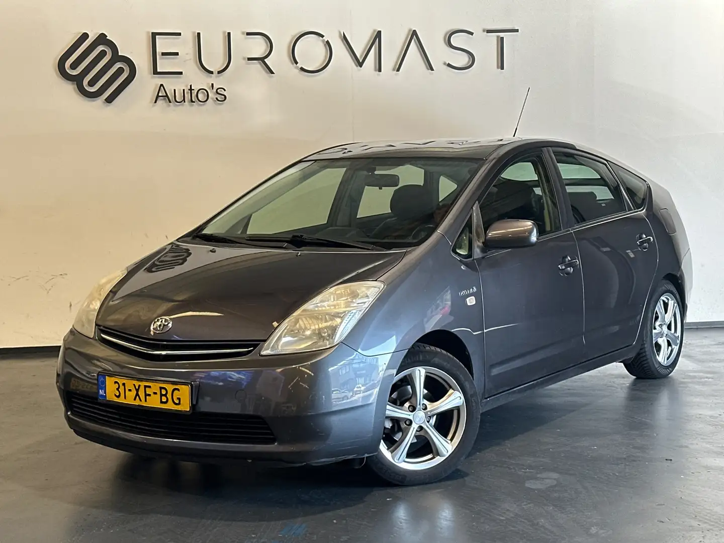 Toyota Prius 1.5 VVT-i Cruise - Clima - Nieuw apk - Navi Grijs - 1