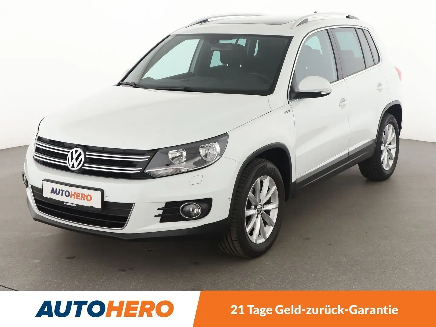 Volkswagen Tiguan 1.4 TSI Lounge Sport & Style BMT*NAVI*TEMPO*CAM* Weiß - 1