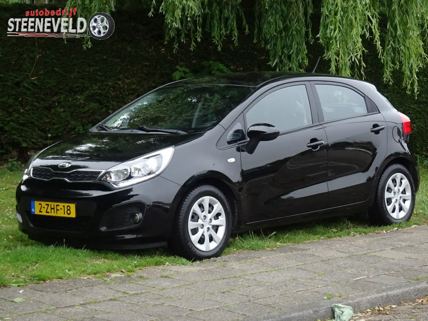 Kia Rio 1.2 CVVT BusinessLine met Radio en Airco Zwart - 1