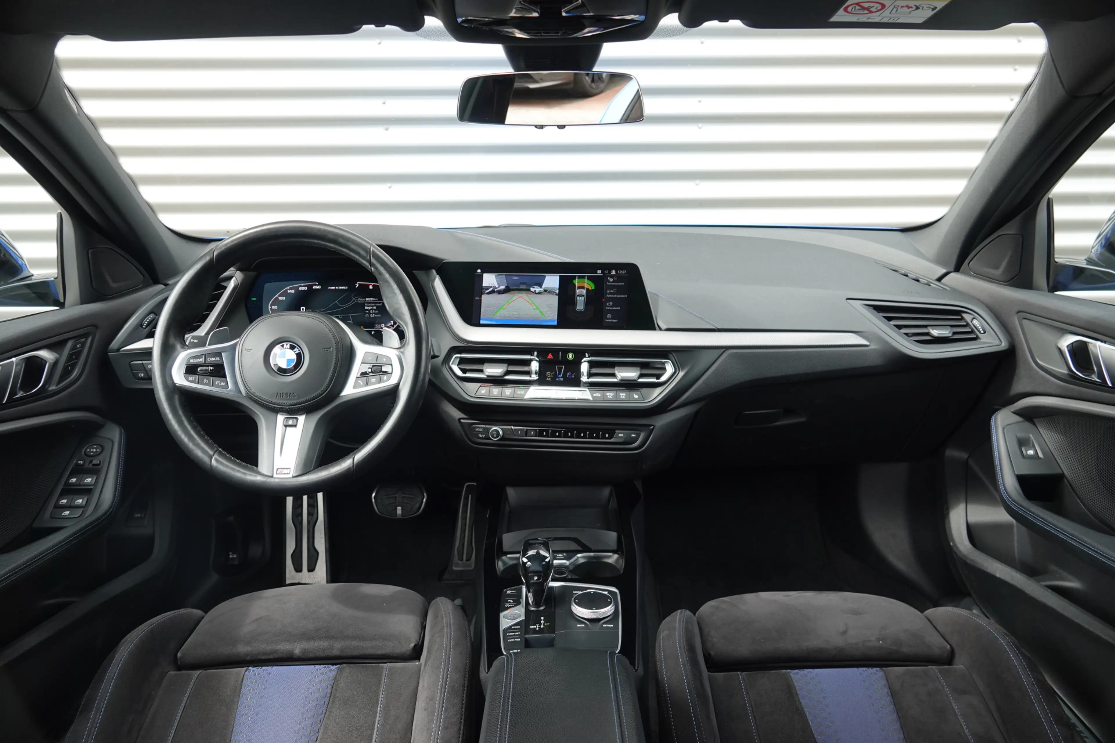 BMW 135 1-serie M135i xDrive High Executive | M Performanc — photo 13