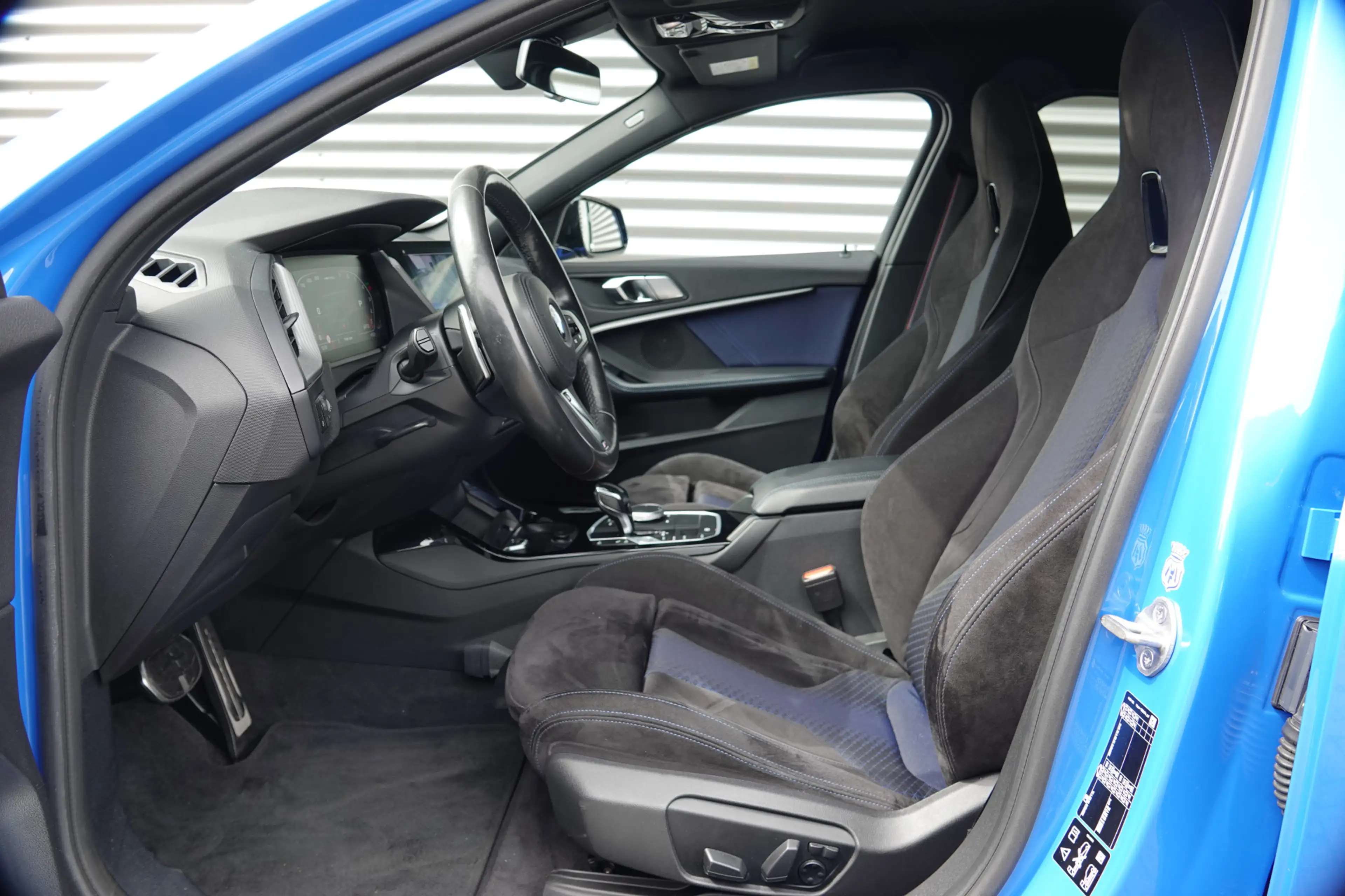 BMW 135 1-serie M135i xDrive High Executive | M Performanc — photo 8