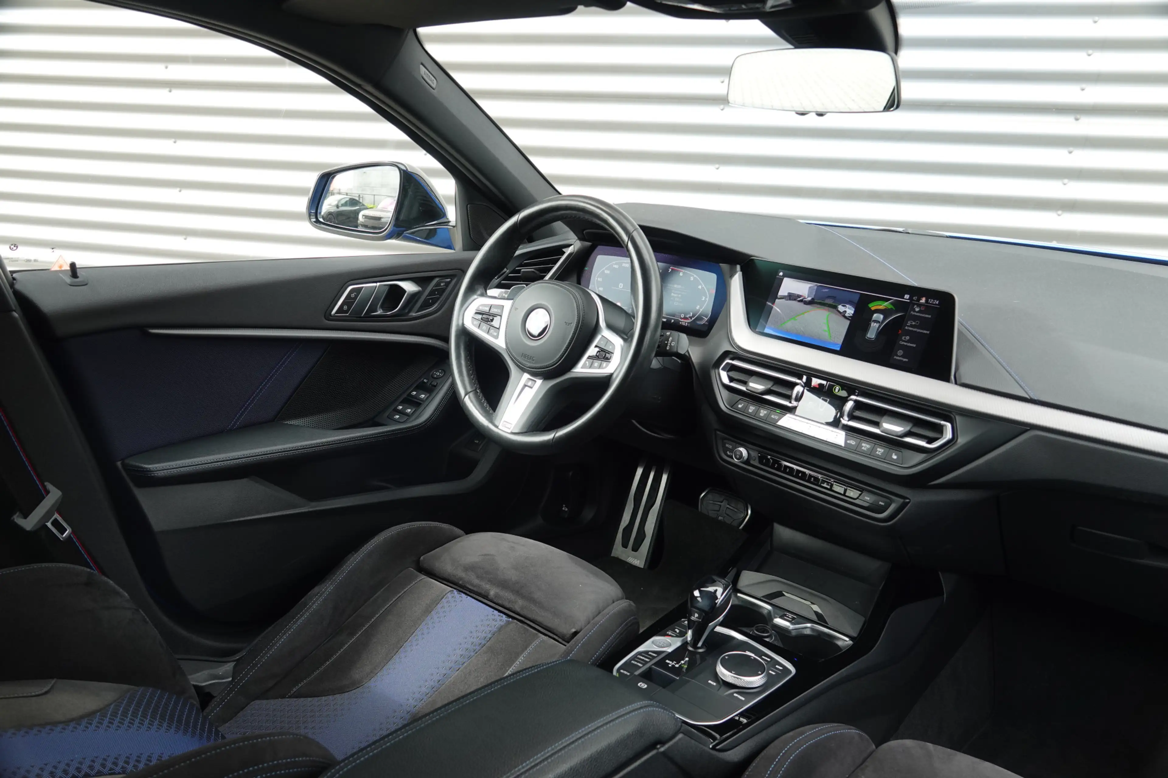 BMW 135 1-serie M135i xDrive High Executive | M Performanc — photo 23