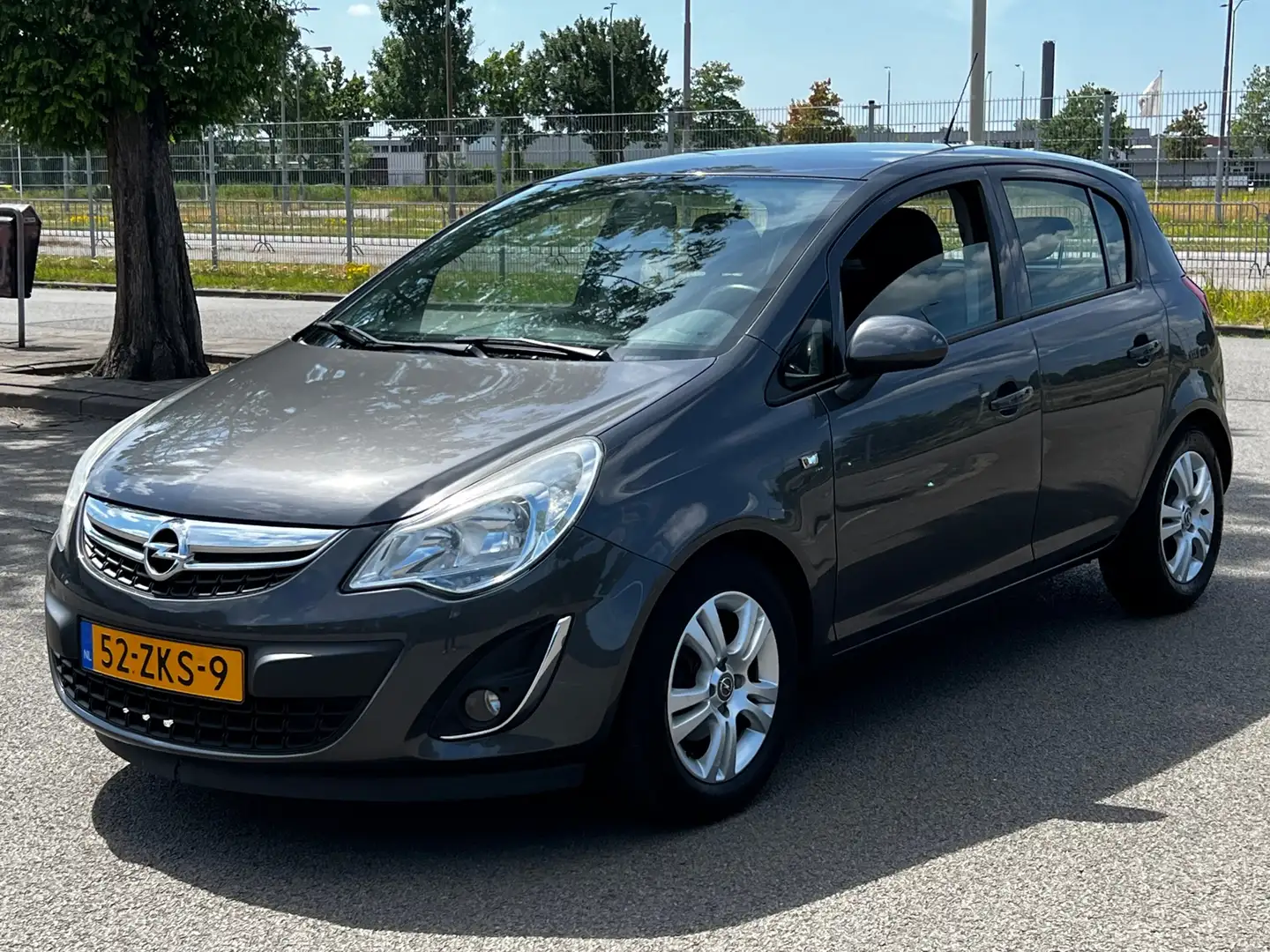 Opel Corsa 1.4-16V Anniversary Edition - Dealer onderhouden - Grijs - 1