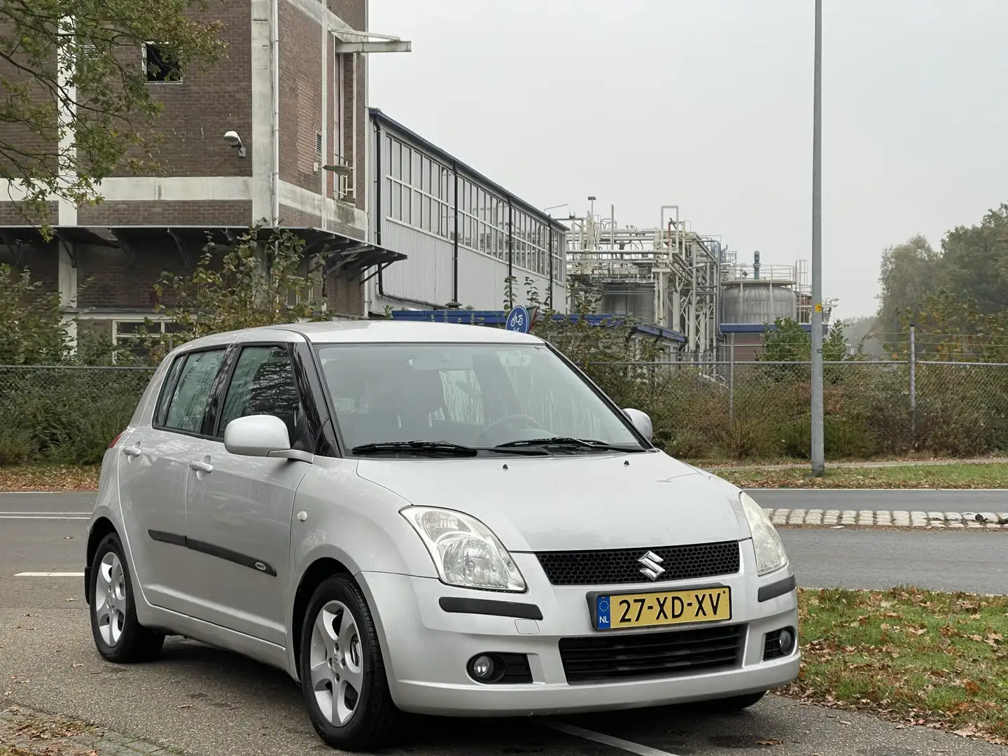 Suzuki Swift 1.3 Shogun | 2e Eigenaar | Airco | 5 Deurs | Licht Grijs - 1