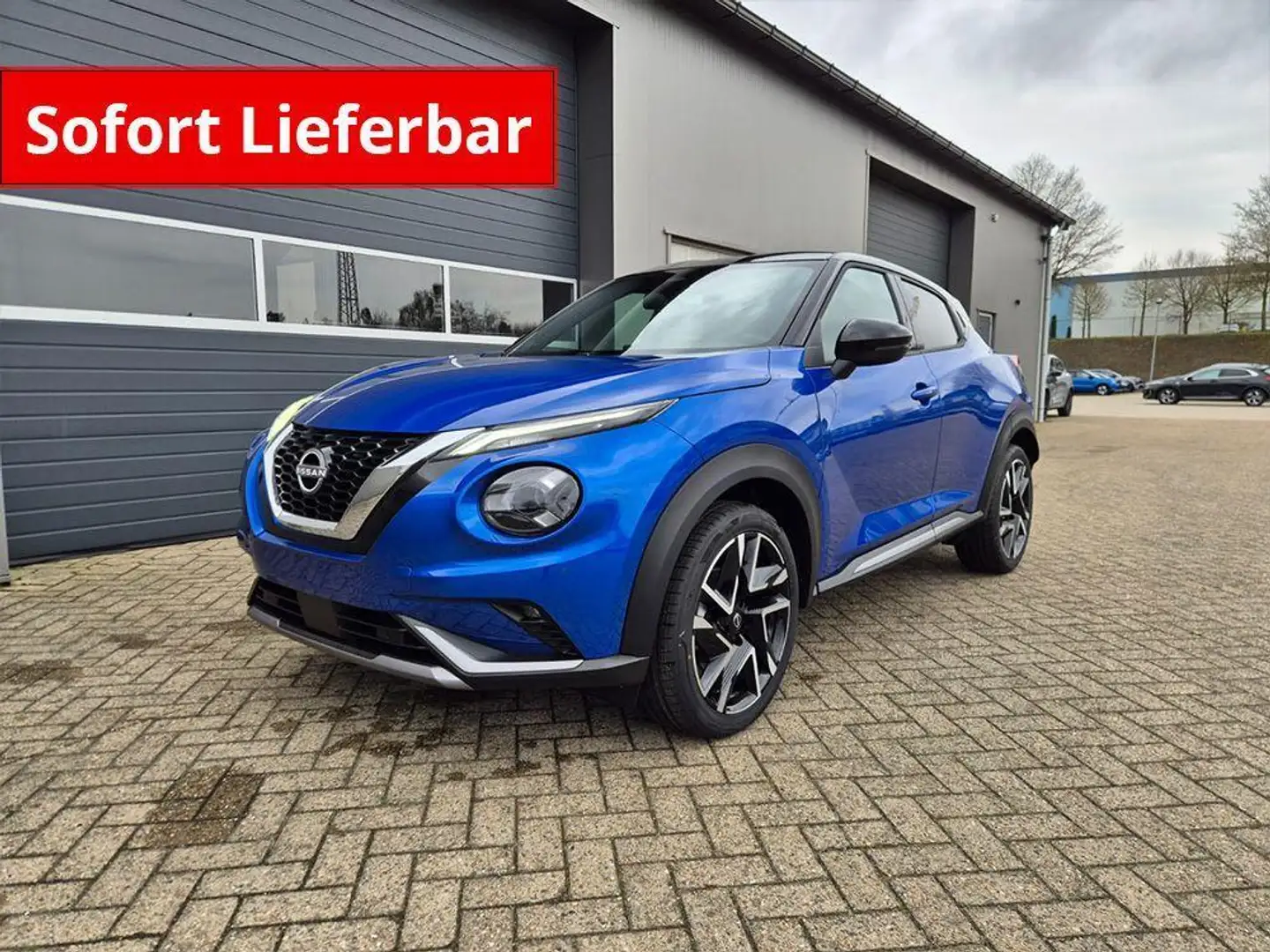 Nissan Juke 1.0 DIG-T 114PS N-Design Automatik Teil-Leder K... Blau - 1