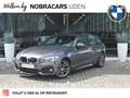 BMW 118 1-serie 118i Executive M Sport Automaat / Sportsto Grijs - thumbnail 1