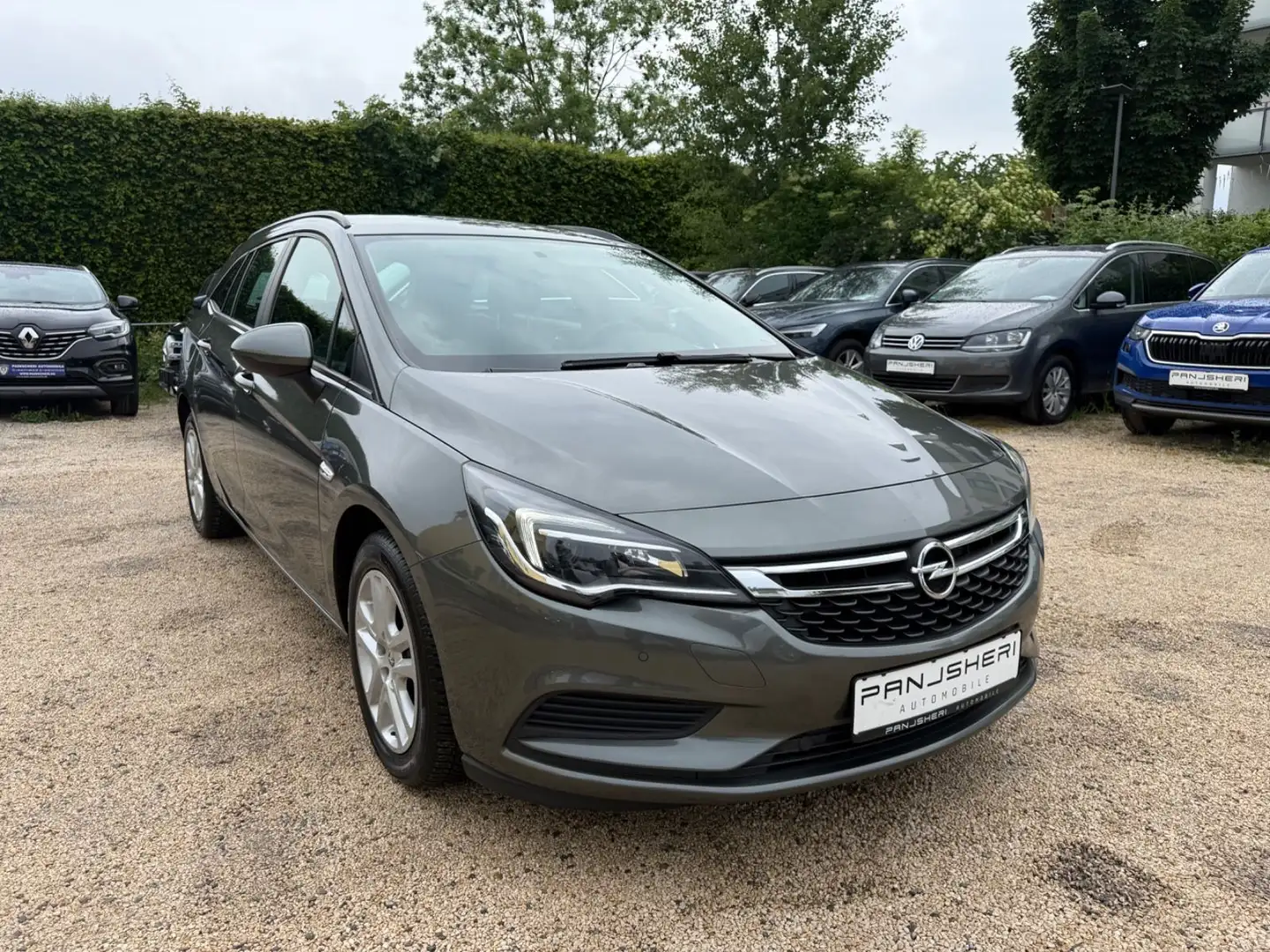 Opel Astra K 1.6 CDTI Aut. Sports Tourer Edition Navi Grijs - 1