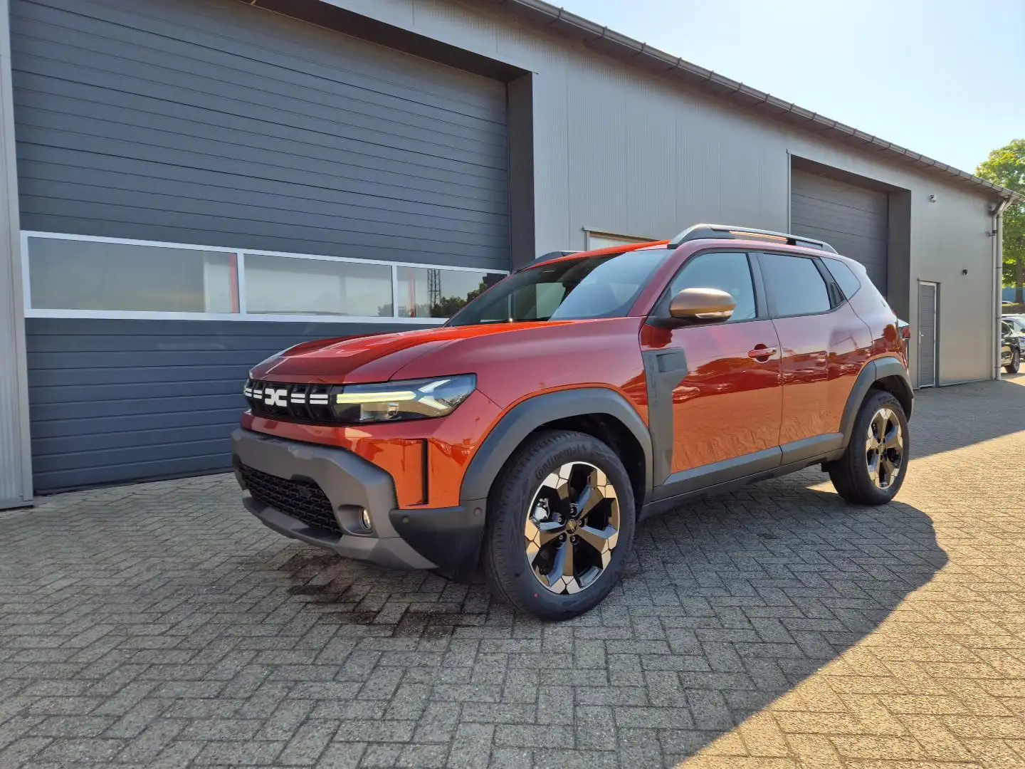 Dacia Duster Extreme Hybrid 140PS Automatik 1.6 SCE Sitzheiz... Braun - 1