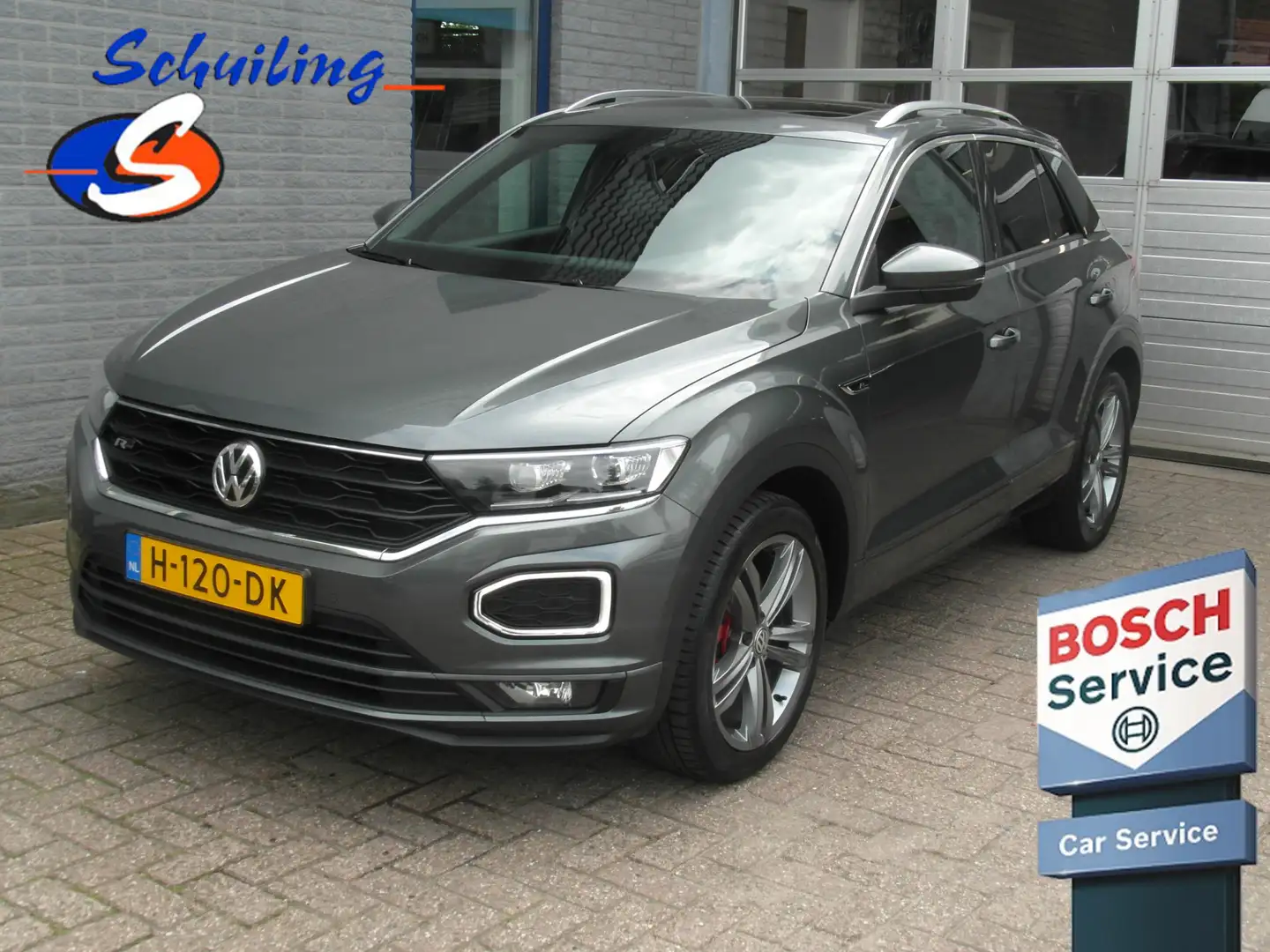 Volkswagen T-Roc 1.5 TSI Sport Business R Inclusief Afleveringskost Grau - 1