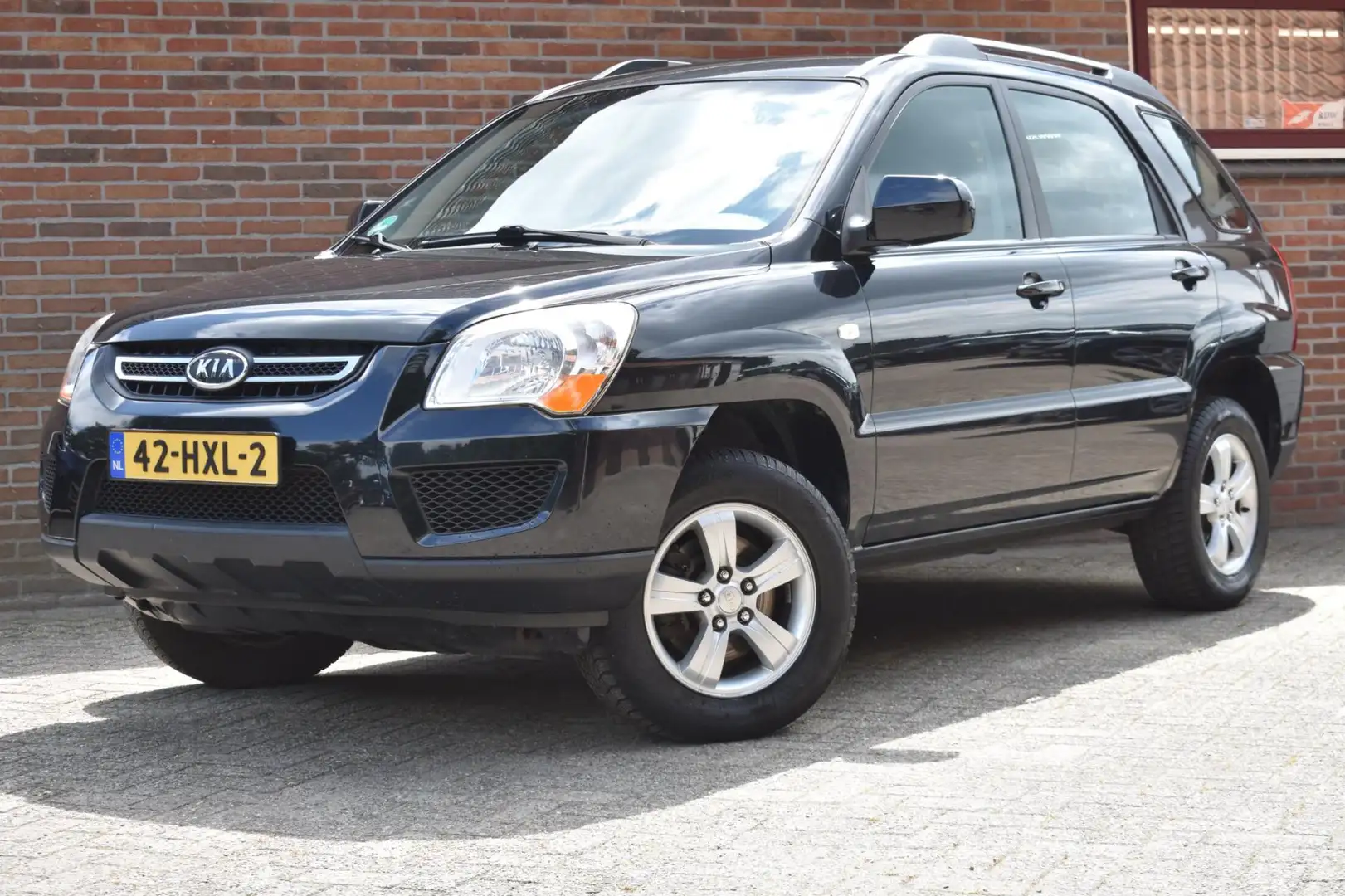 Kia Sportage 2.0 CVVT X-pect '09 Airco Inruil mogelijk Zwart - 1