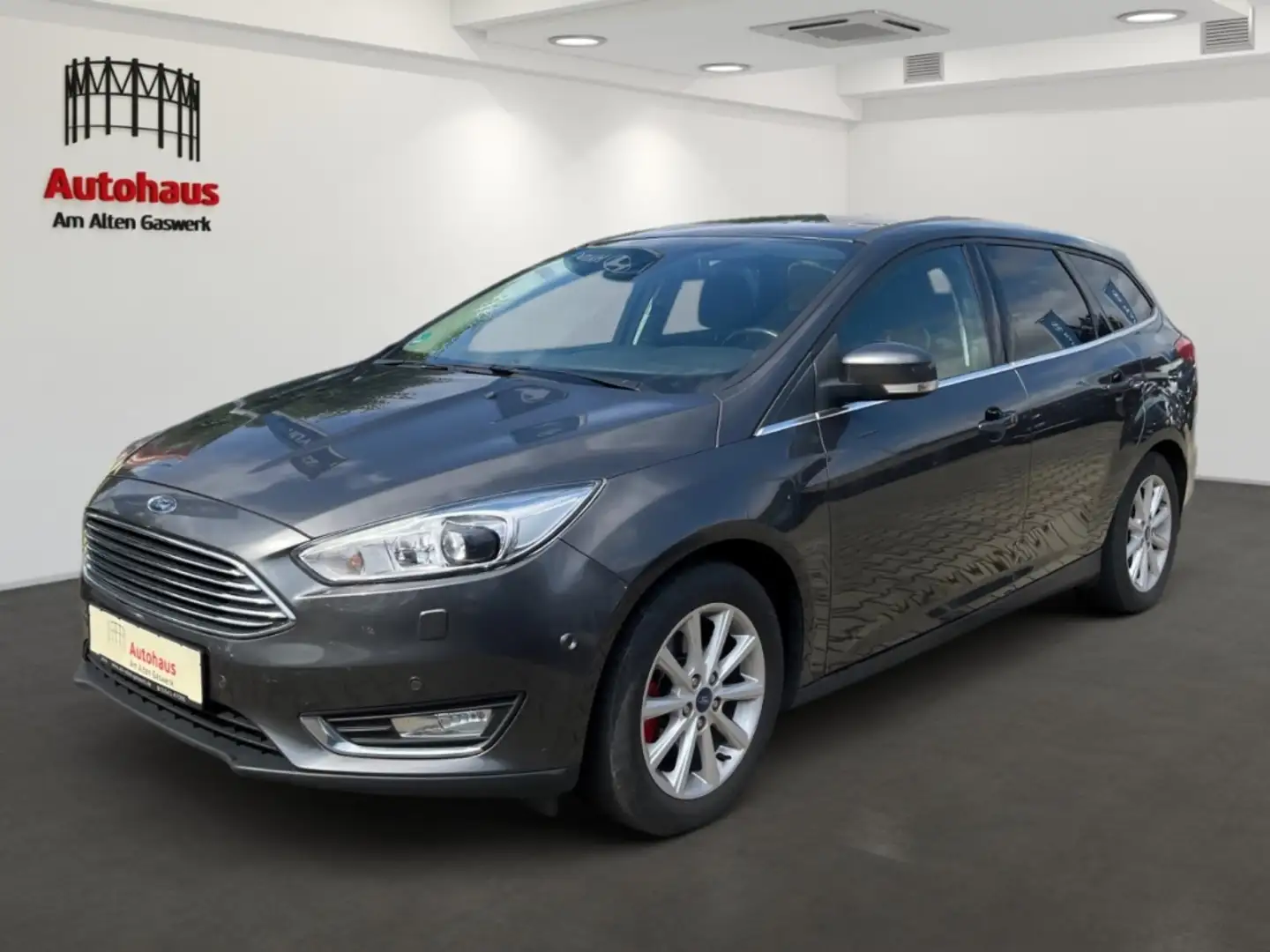Ford Focus KOMBI TITANIUM+XENON+AHZV+NAVI+SCHECKHEFTGEPFLEGT Gris - 1