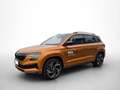 Skoda Karoq Sportline 2,0 TSI 140 kw7-Gang automat. 4x Oranje - thumbnail 1