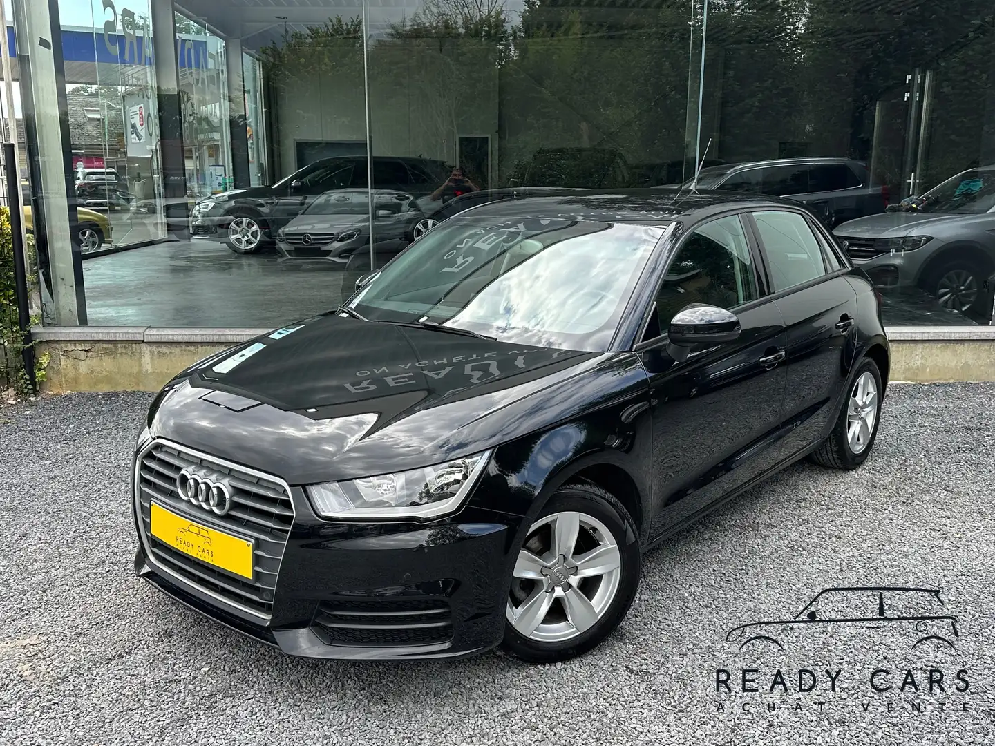 Audi A1 *1.0*95CV*1ER PROP*CARNET COMPLET*NAVI*GARANTIE* Zwart - 1