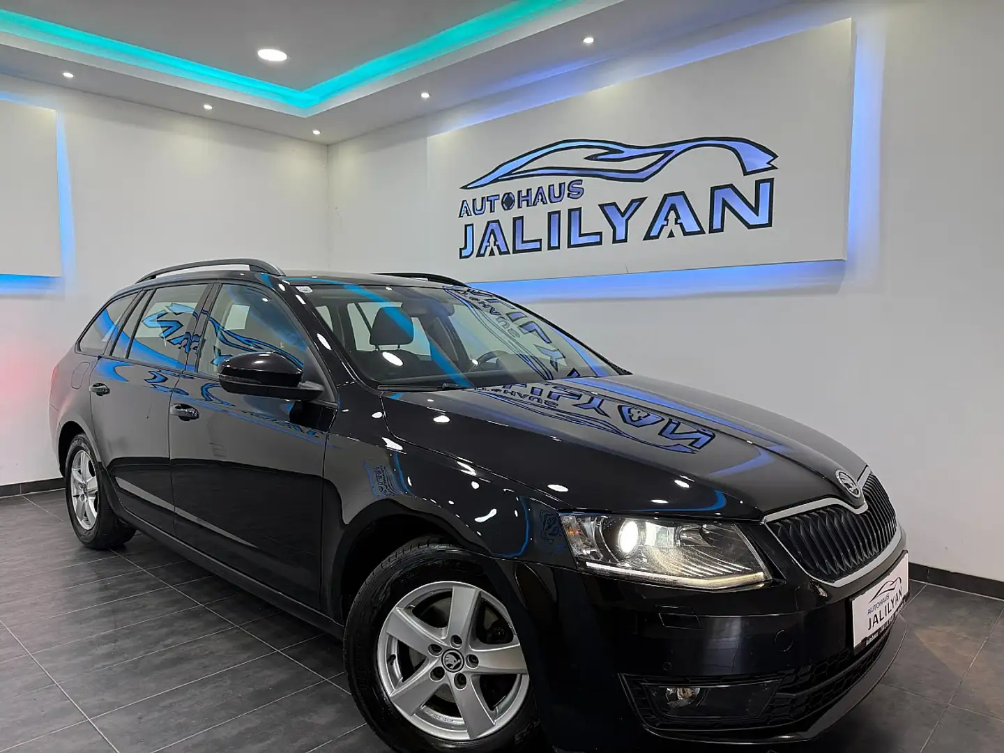 Skoda Octavia Combi 1,6 Green Line TDI, Schwarz - 1