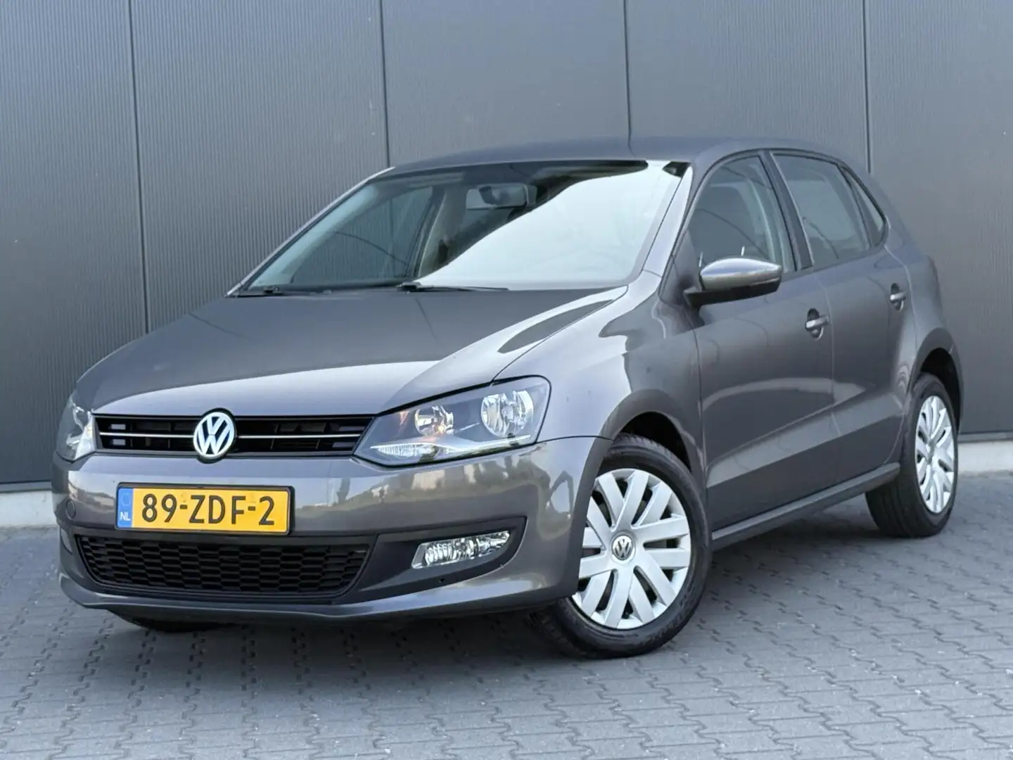 Volkswagen Polo 1.2 TSI Comfortline Airco - Cruise - 5-Deurs - Ele Grau - 1