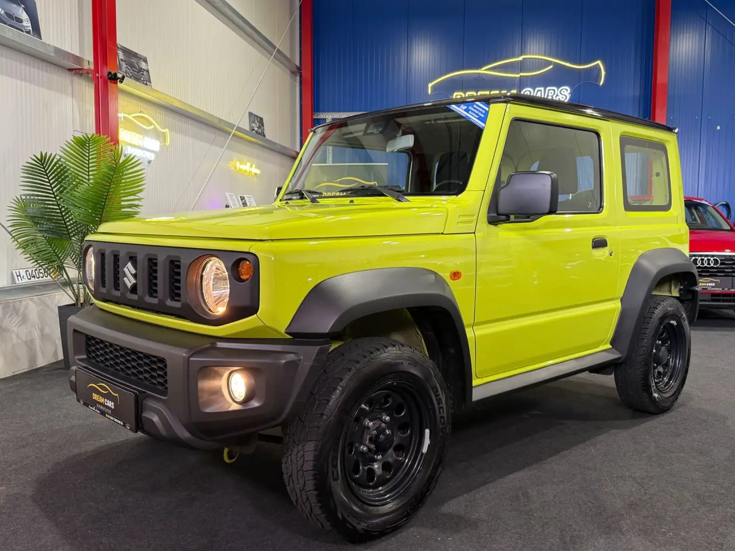 Suzuki Jimny Comfort AllGrip*1HAND*SHZG*BLUETOOTH*KLIMA Grün - 1