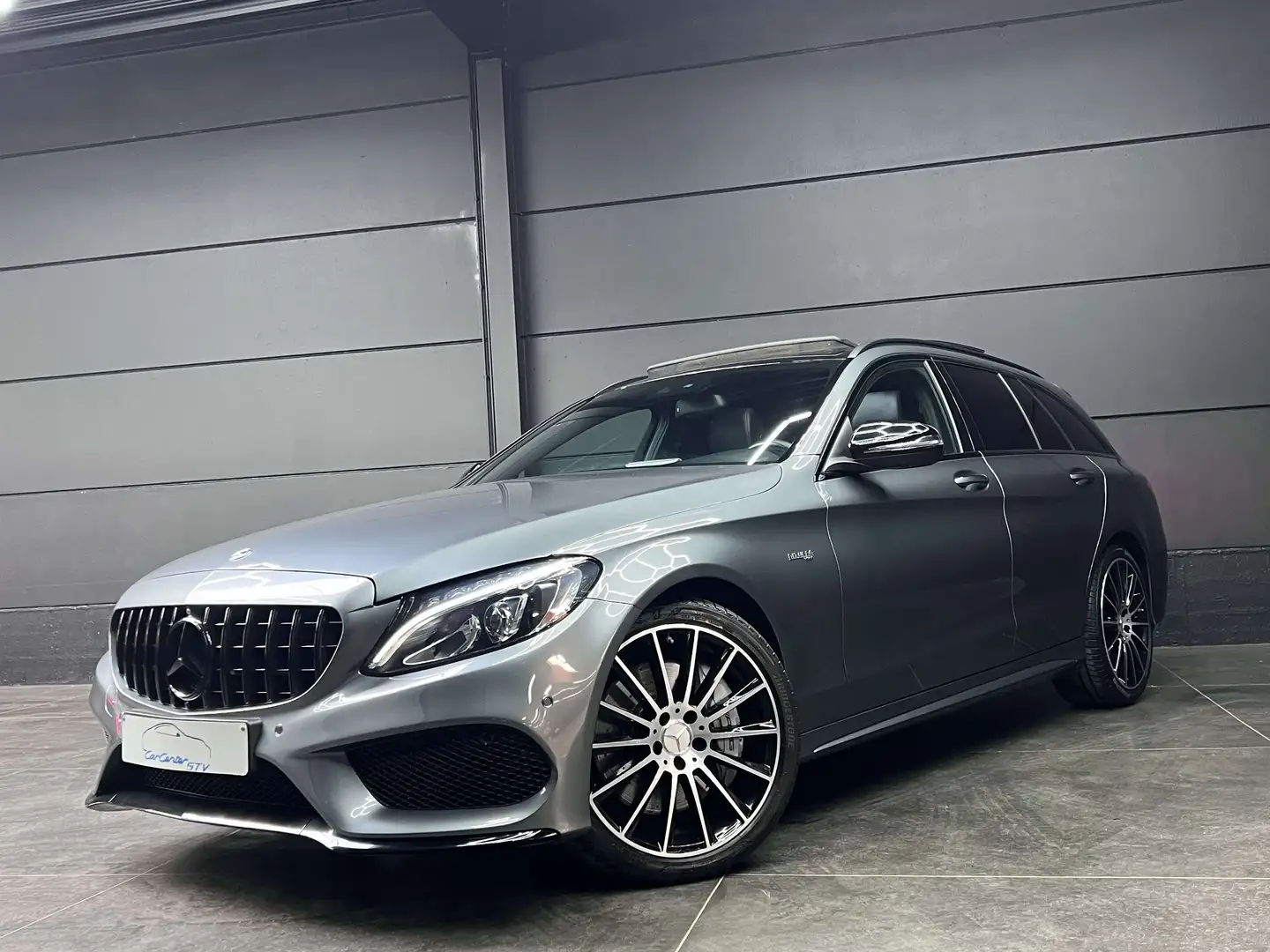 Mercedes-Benz C 43 AMG 4Matic / Perf. exaust / Pano dak / memory seats / Gris - 1