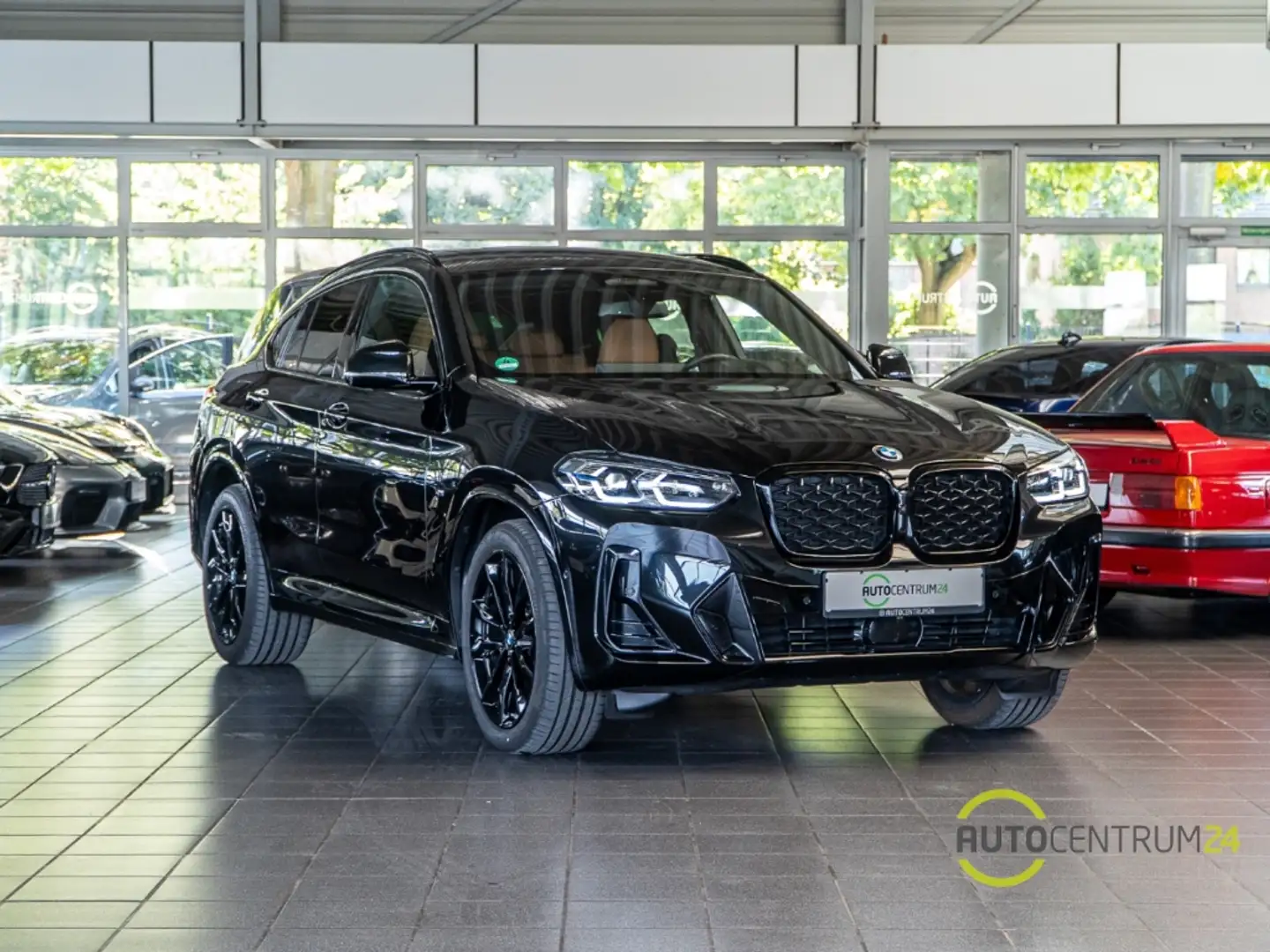 BMW X4 20d M Sport Inno Pano Memo AHK Cognac HK Schwarz - 1