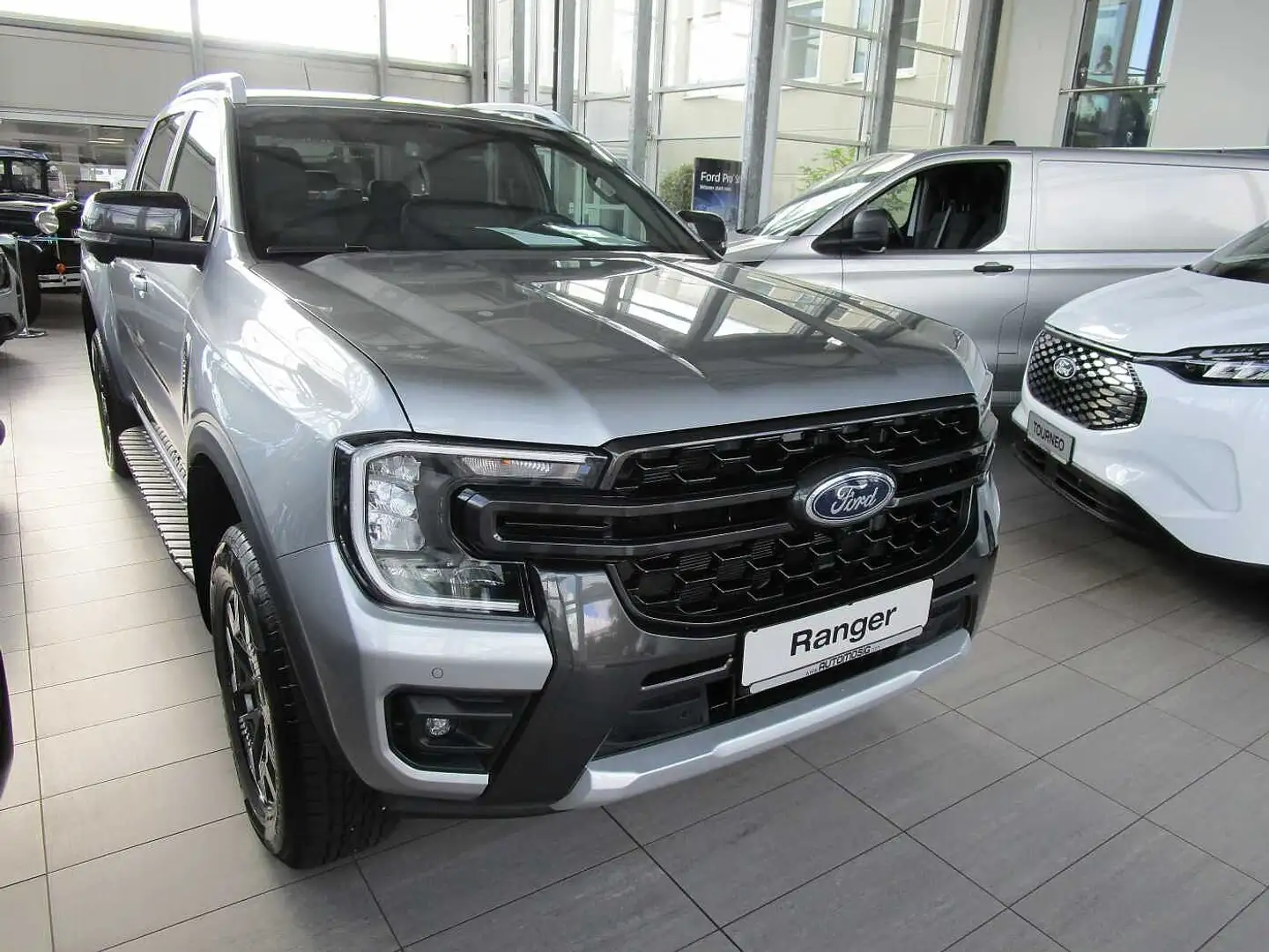 Ford Ranger 4x4 PHEV 2,3l EB DOKA Wildtrak/AHK/Rollo elektr. Silber - 1