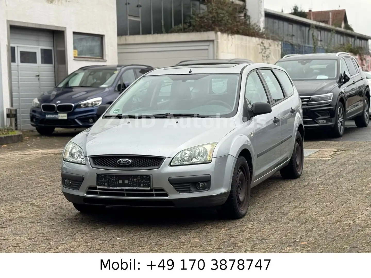 Ford Focus Turnier Trend*1HAND*AHK*PDC*Schiebedach Silber - 1