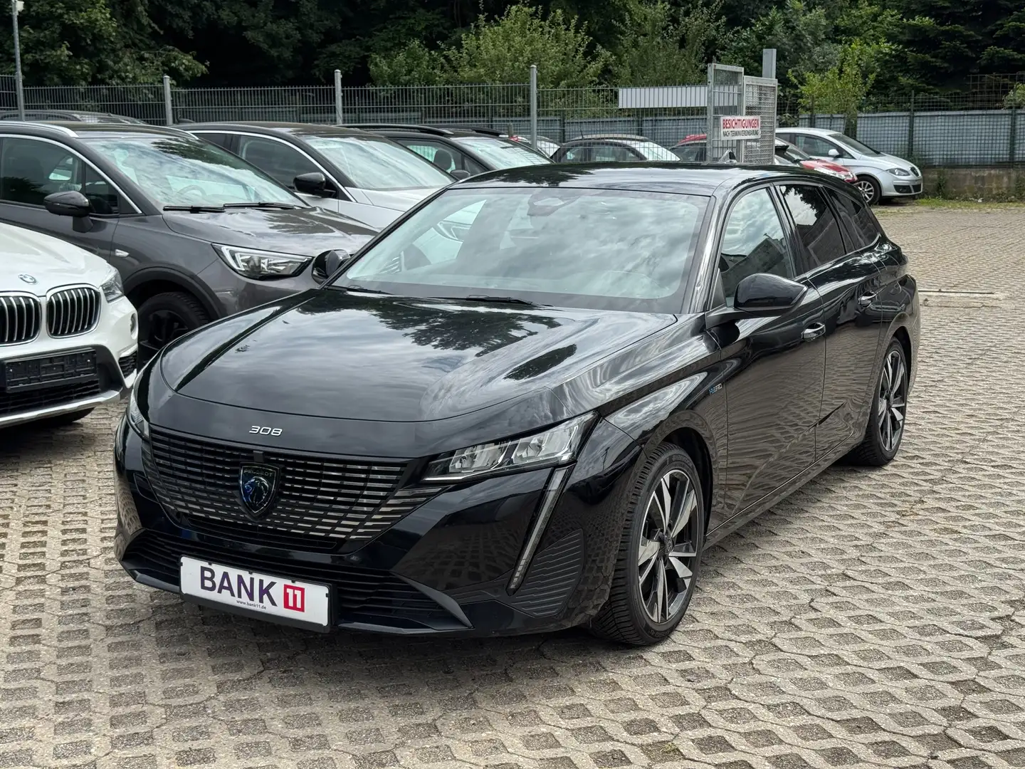 Peugeot 308 1,6Hybrid*Teilleder*Navi*Klima* Noir - 1