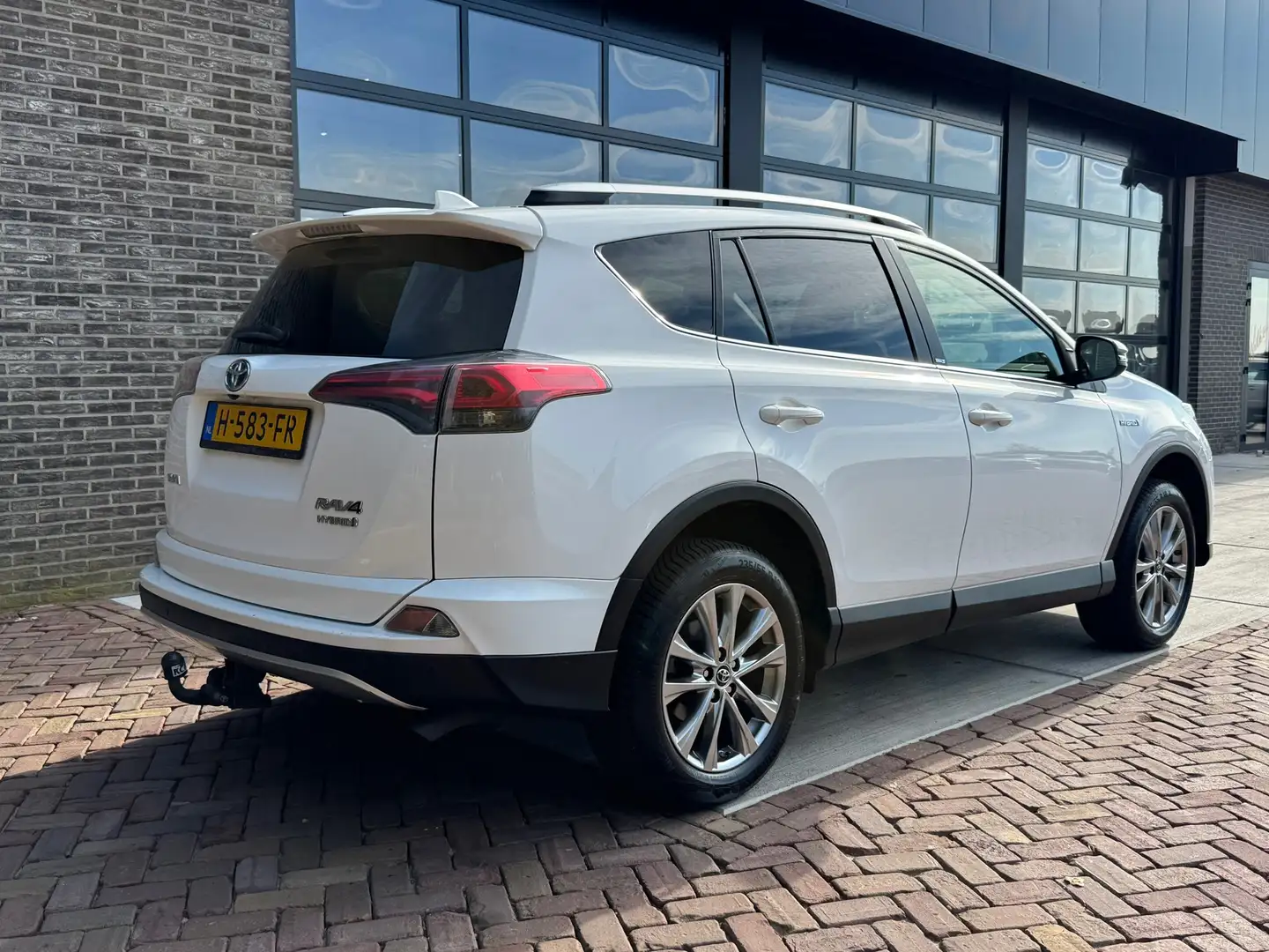 Toyota RAV 4 2.5 Hybrid AWD Style | Trekhaak | Autm | Navi | Cl Bianco - 2