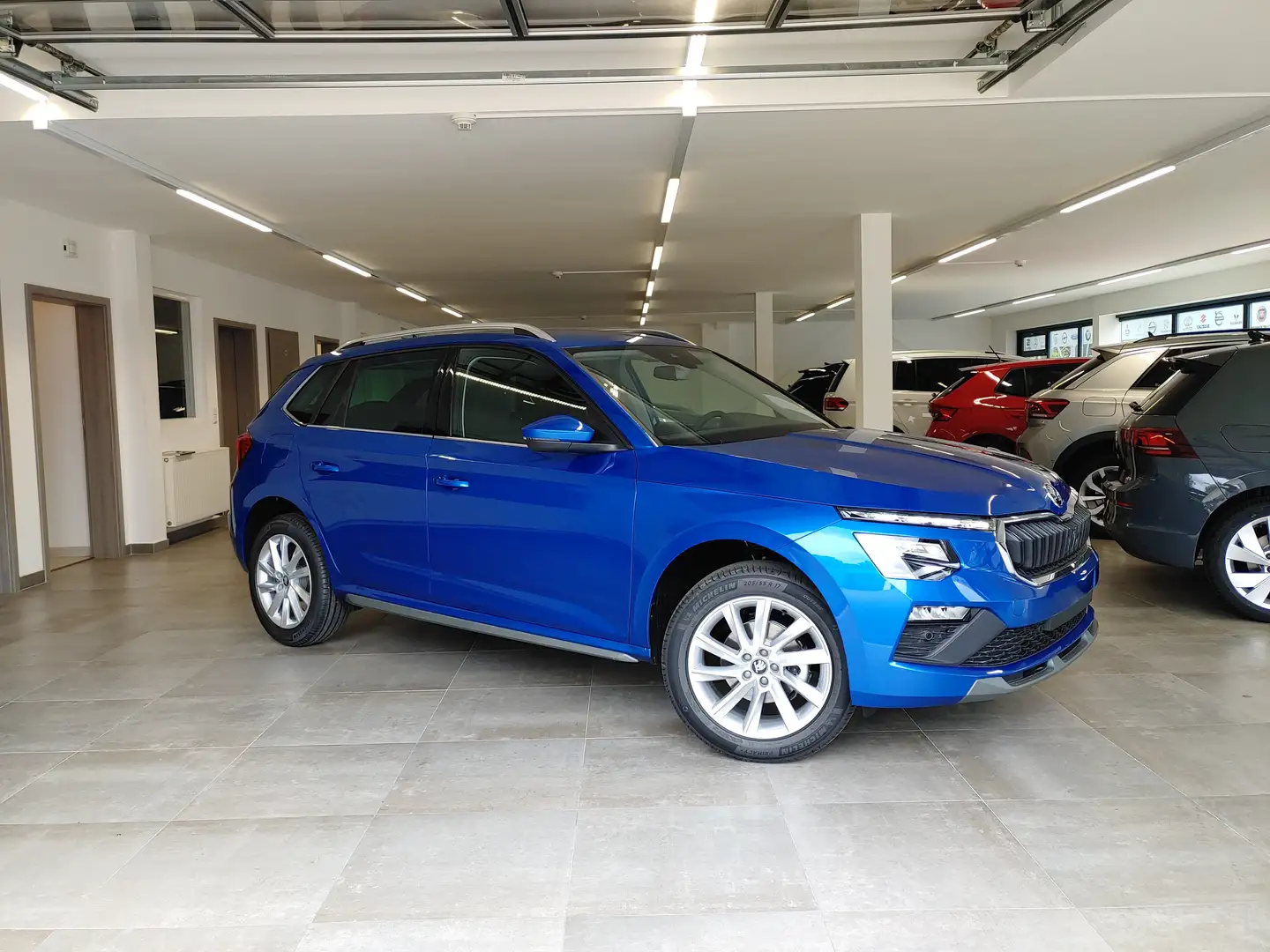 Skoda Kamiq 1.0 TSI DSG Selection Matrix/5Jahre/17"/Kamera/FSH Blau - 1