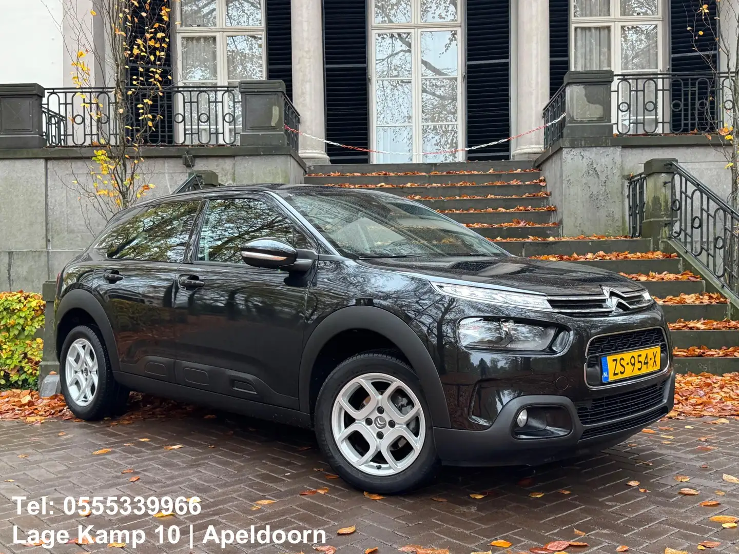 Citroen C4 Cactus 1.2 PureTech Business CarPlay/Navi Climate Cruise Zwart - 1