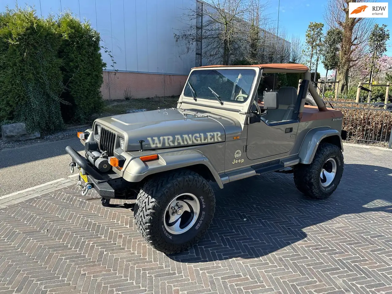 Jeep Wrangler 4.0i Sahara 6 cilinder YJ Cabrio met softtop, foto 1