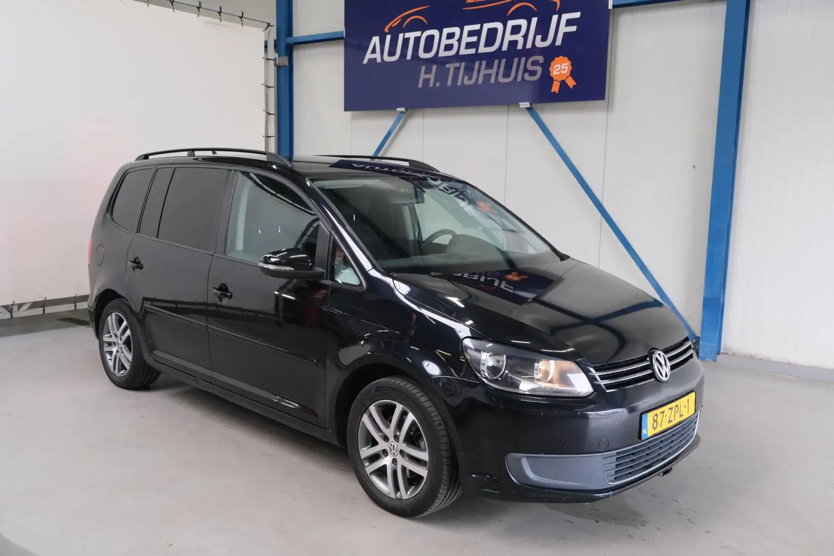 Volkswagen Touran 1.6 TDI Comfortline BlueMotion 7p. Automaat. Zwart - 1