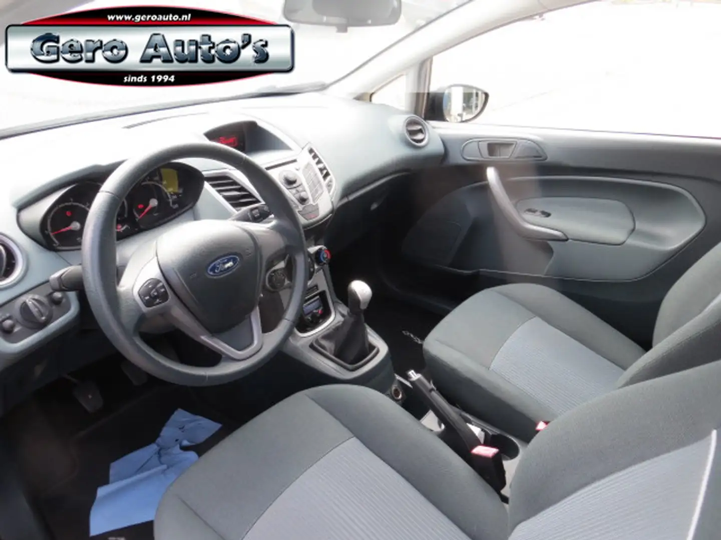 Ford Fiesta 1.25 Limited nl auto 3 drs ,airco ,stbkr ,elec pak Zwart - 2