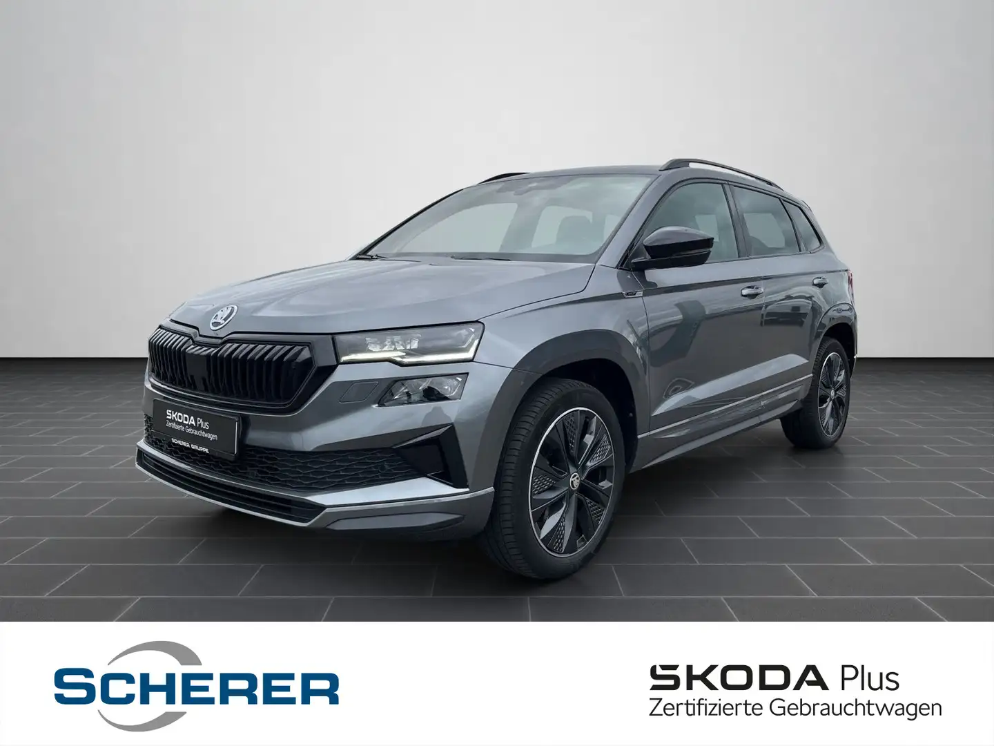 Skoda Karoq Sportline 1,5TSI DSG NAV SHZ LED ACC KAM LM Grau - 1