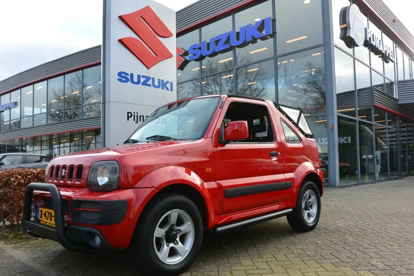 Suzuki Jimny 1.3 Cabrio 4x4 Airco / Leder / Side-bars / Push-ba Červená - 2