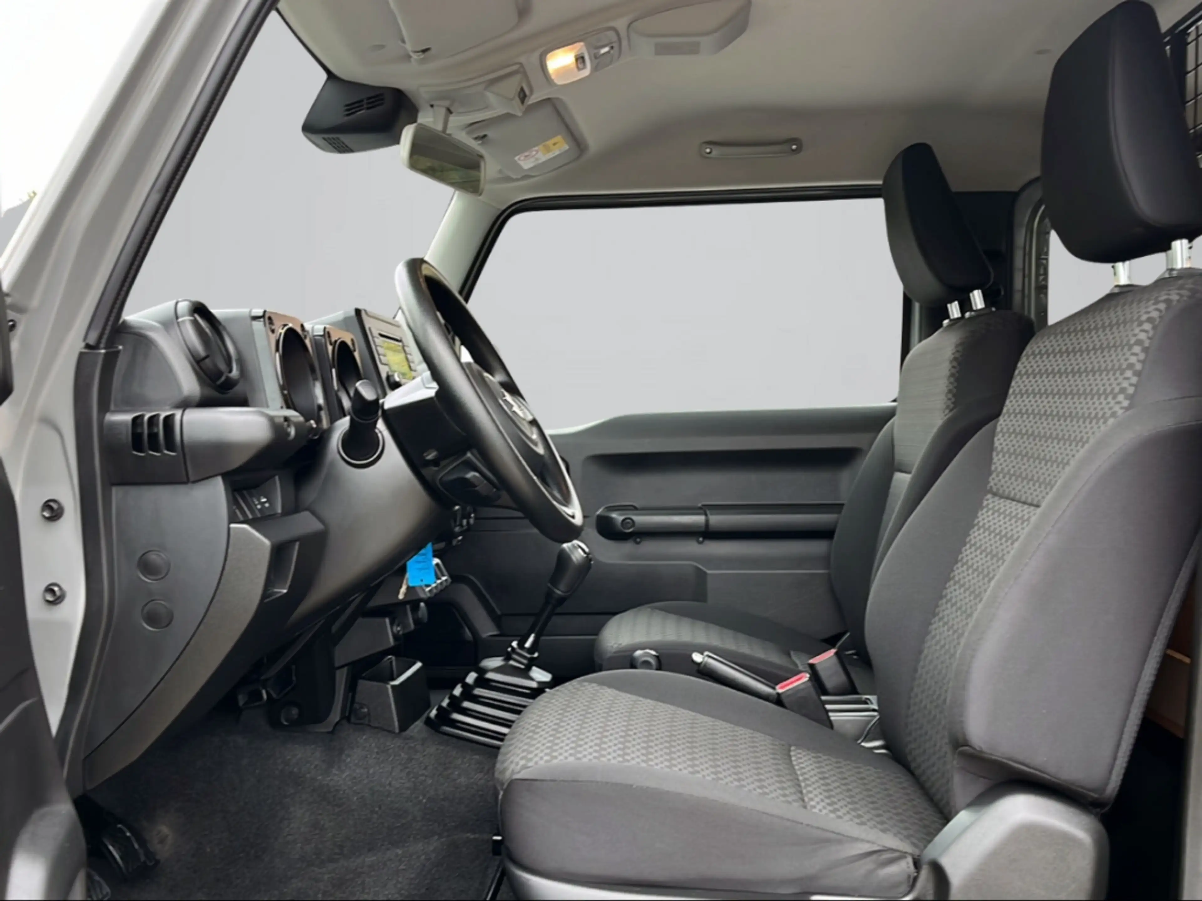 Suzuki Jimny Comfort Allgrip NFZ DAB SHZ Spurhalteass. Fernlich — photo 8