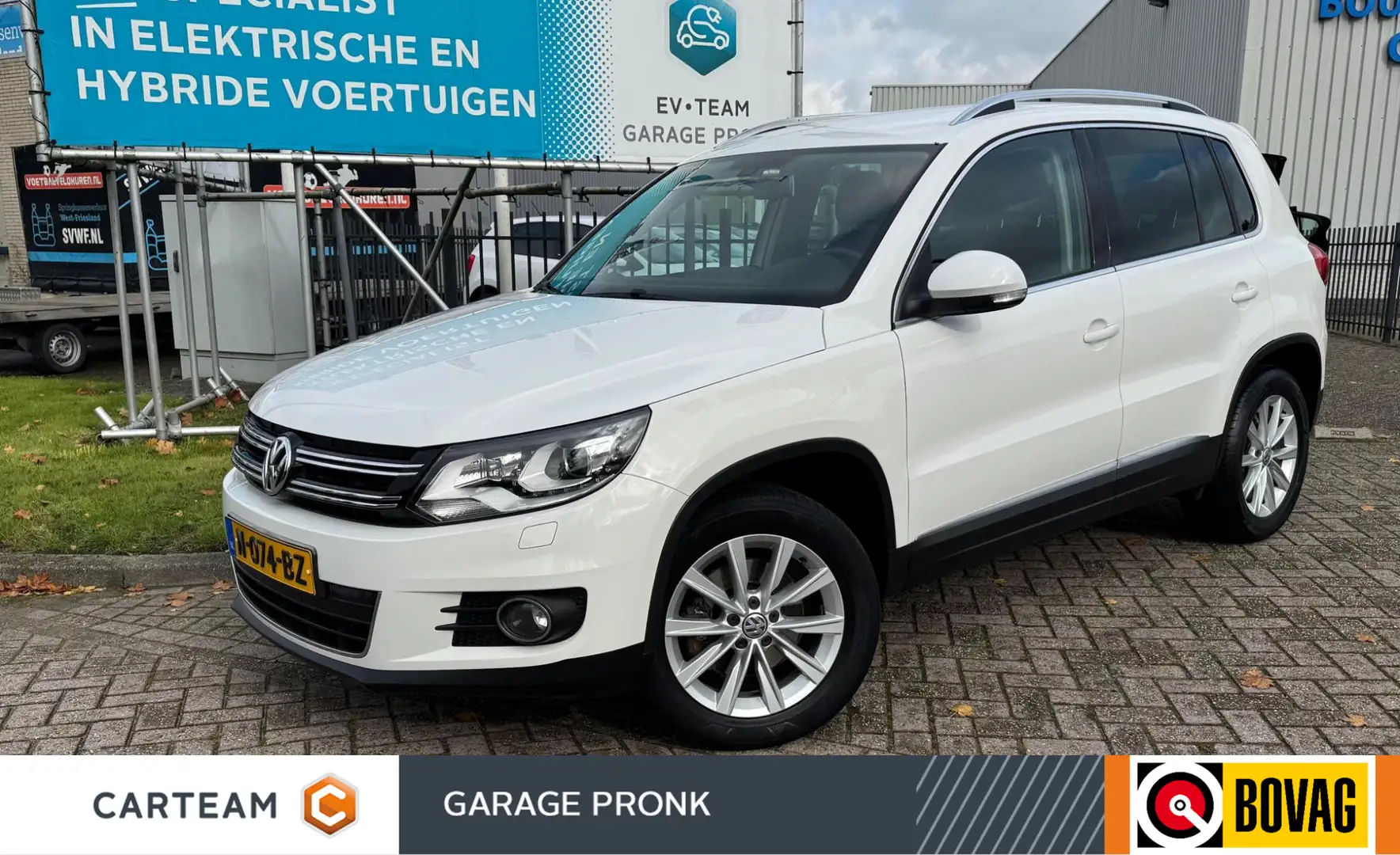 Volkswagen Tiguan 1.4 TSI Sport&Style NAVI/PDC/XENON/CRUIS Wit - 1