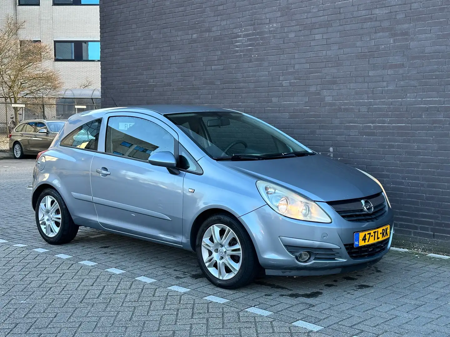 Opel Corsa 1.4-16V Grijs - 1