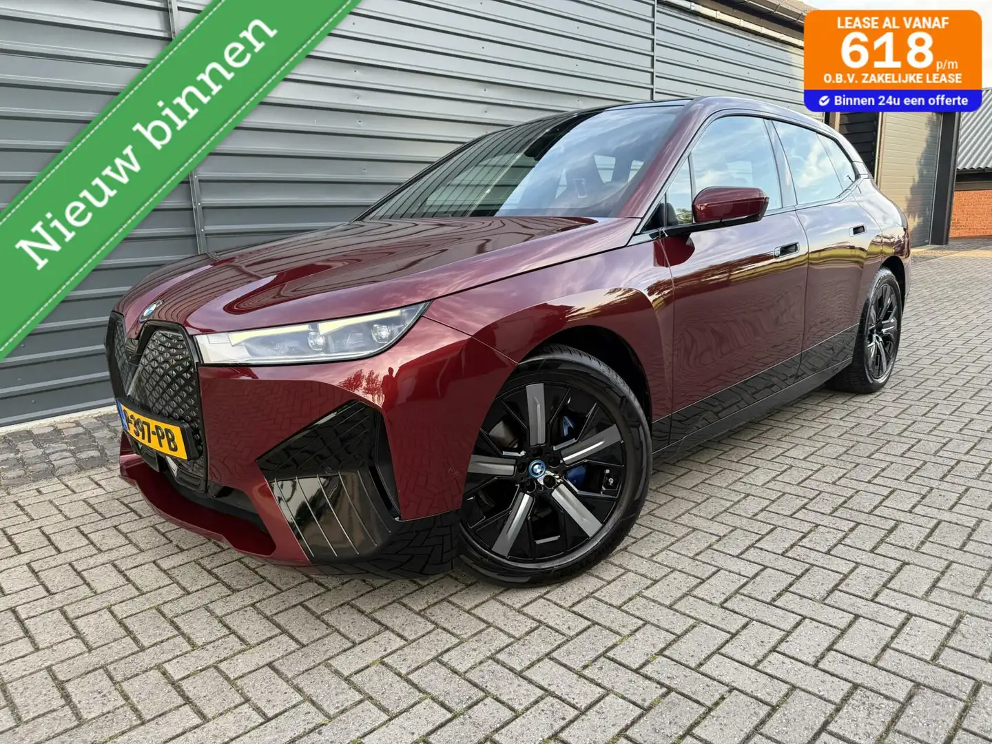 BMW iX xDrive40 High Executive 77 kWh SOH 99% Led v+a Aut Rood - 1