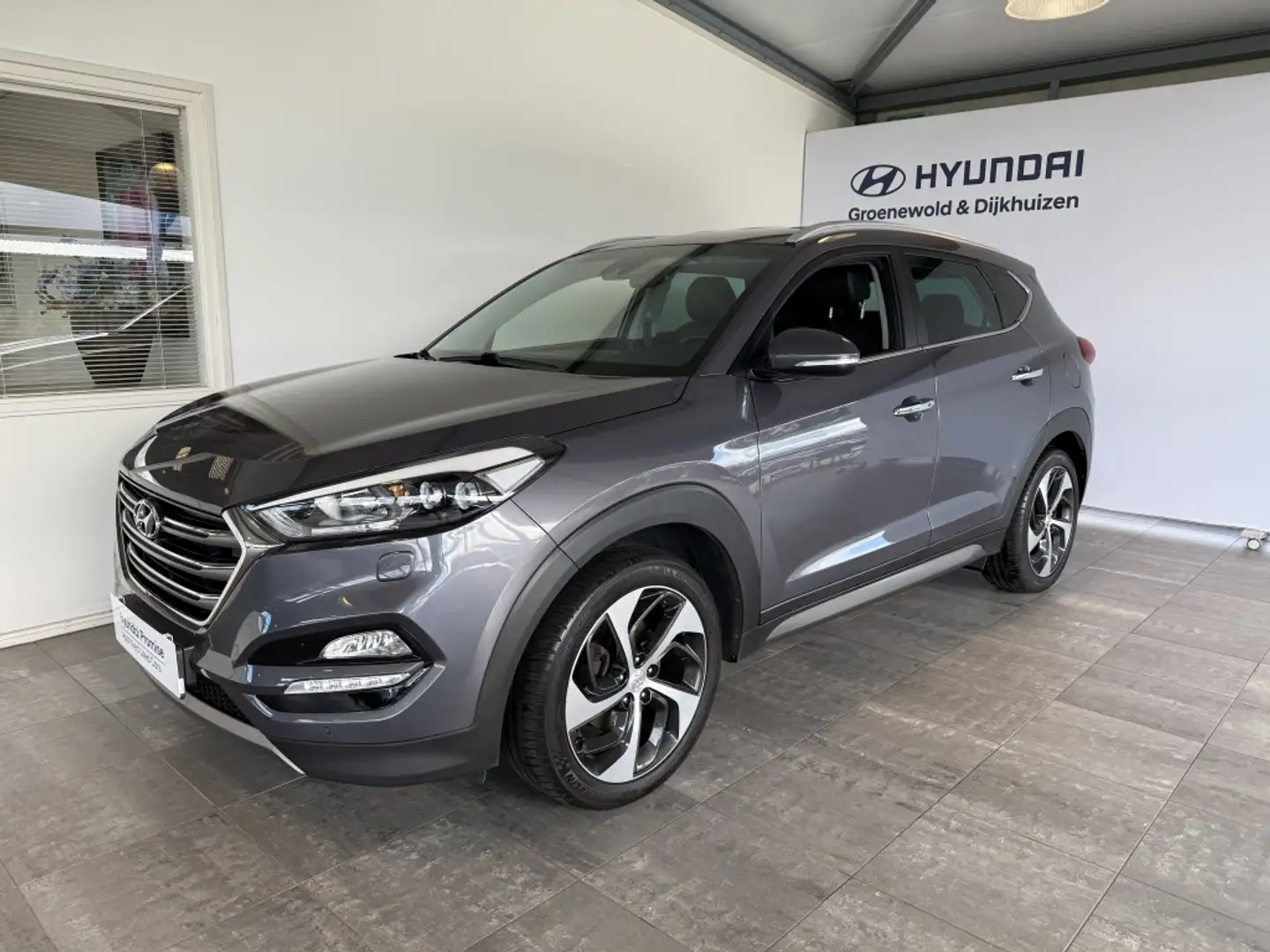 Hyundai TUCSON 1.6 T-GDi Premium Grijs - 1