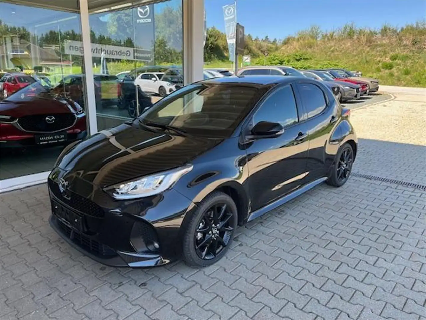Mazda 2 Hybrid Homura Plus Aut. Jahreswagen inkl. Winter Nero - 1