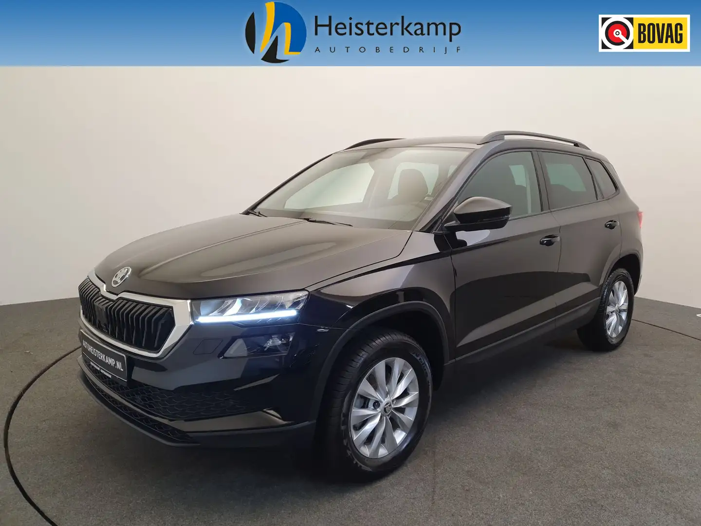 Skoda Karoq 1.0 TSI 110pk Business Edition Camera, Cruise cont Zwart - 1