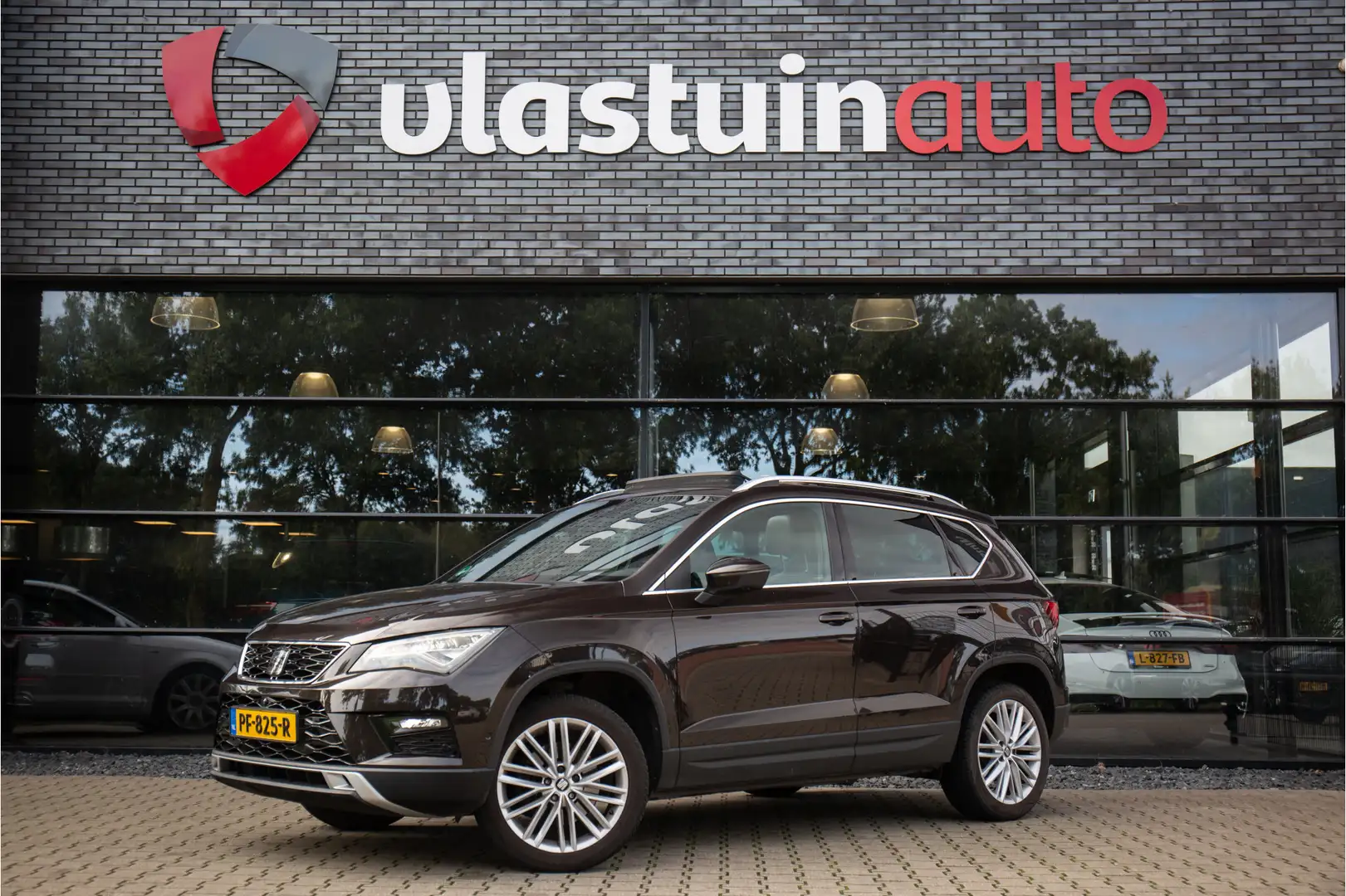 SEAT Ateca 1.4 EcoTSI Xcellence , Panoramadak, Trekhaak, Adap Bruin - 1