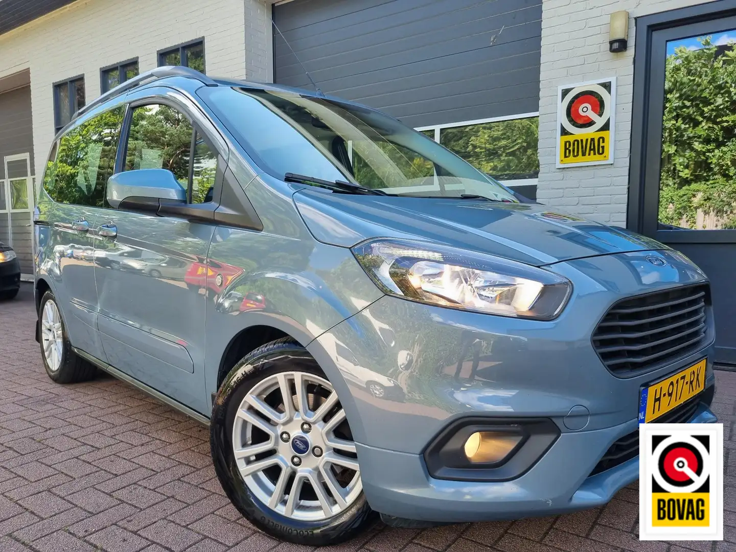 Ford Tourneo Courier 1.0 Titanium AIRCO ECC / CRUISE / TREKHAAK Blauw - 1