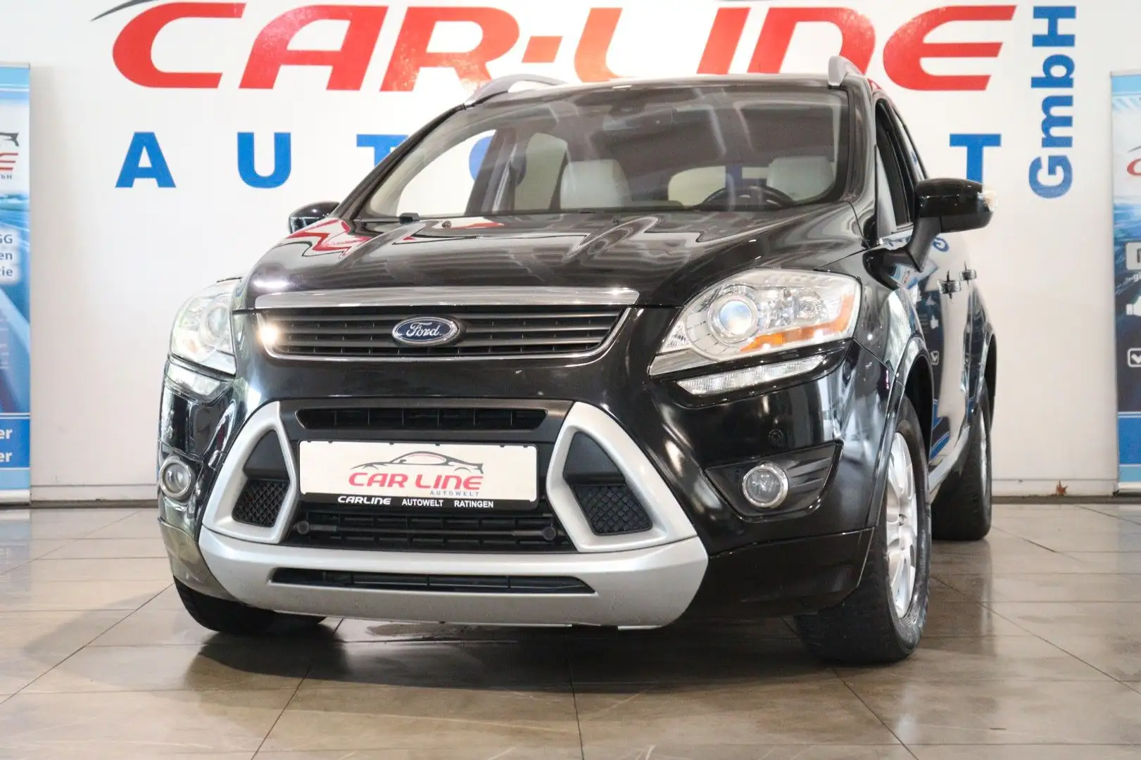 Ford Kuga 4x4 *Individual*Automatik*Nav*Panorama*PDC* - 1