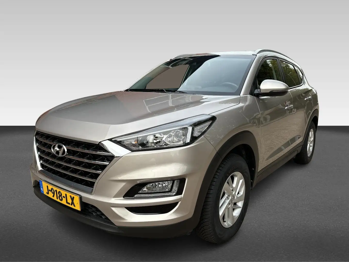 Hyundai TUCSON 1.6 GDI Comfort | navigatie | cruise control | cl Grijs - 1
