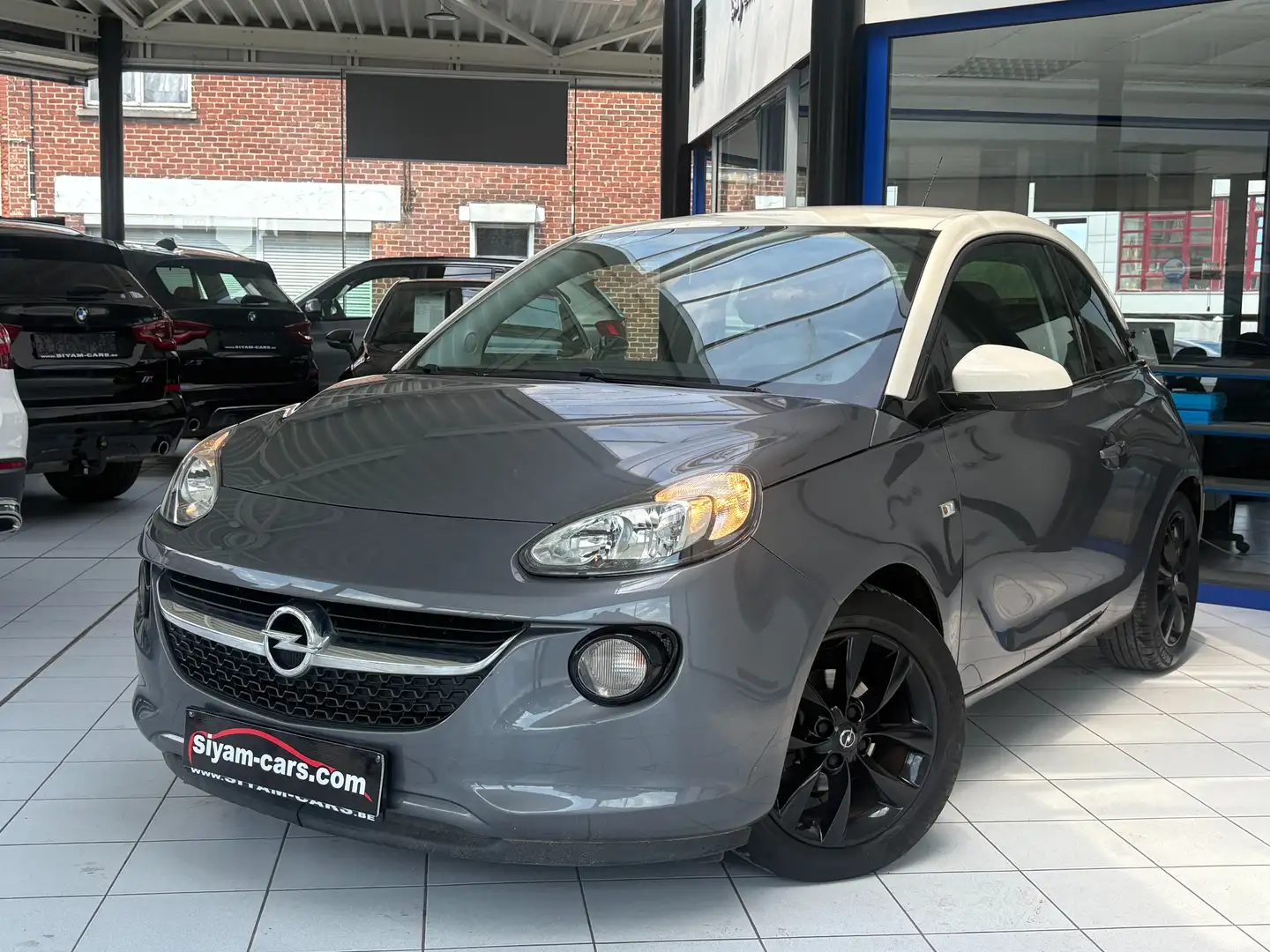 Opel Adam Adam 1.2i *CARPLAY * PDC * JANTES * CLIM * Grijs - 1
