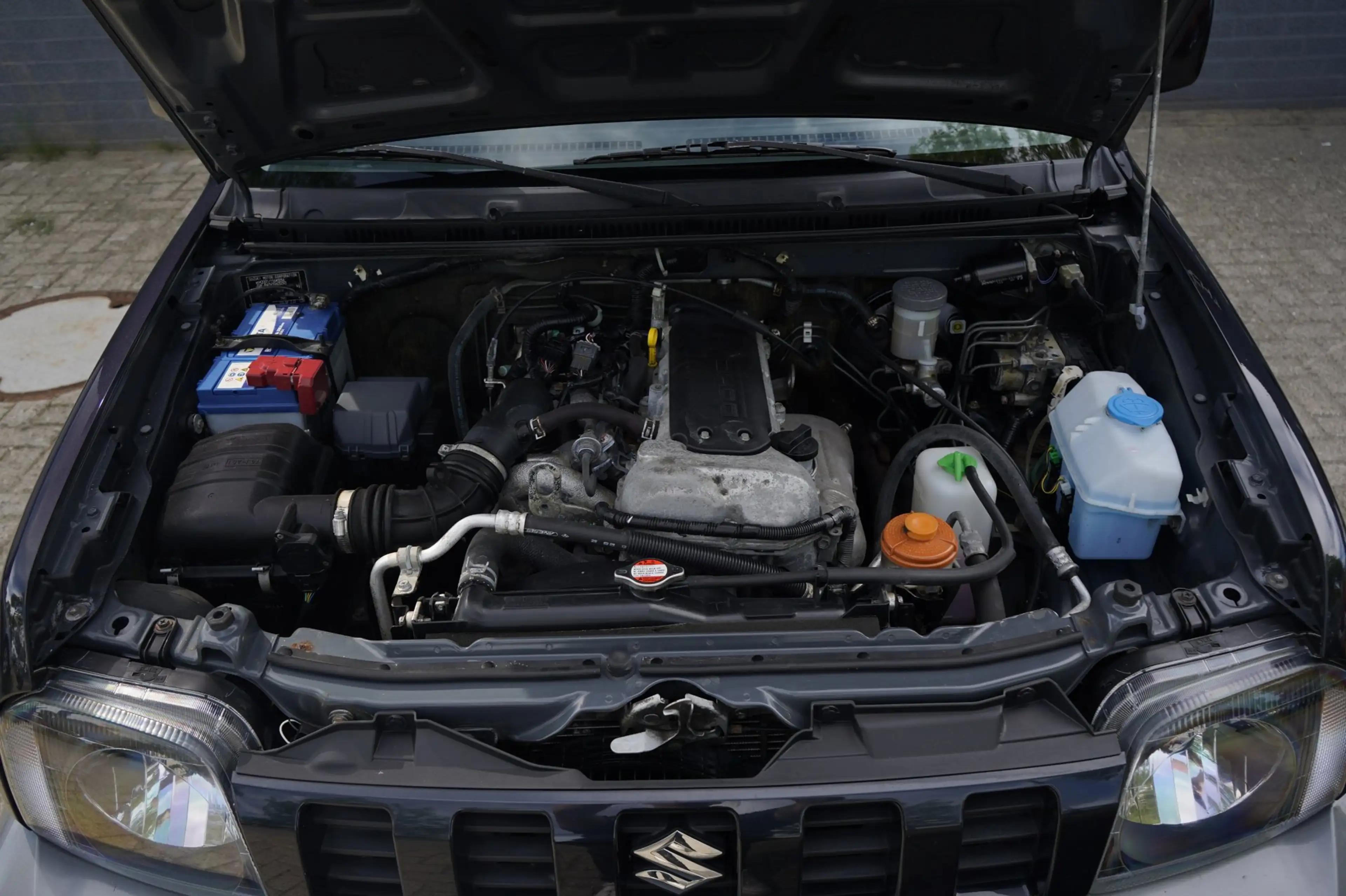 Suzuki Jimny 1.3 Exclusive 4WD, Leer, Airco, Stoelverwarming — photo 24