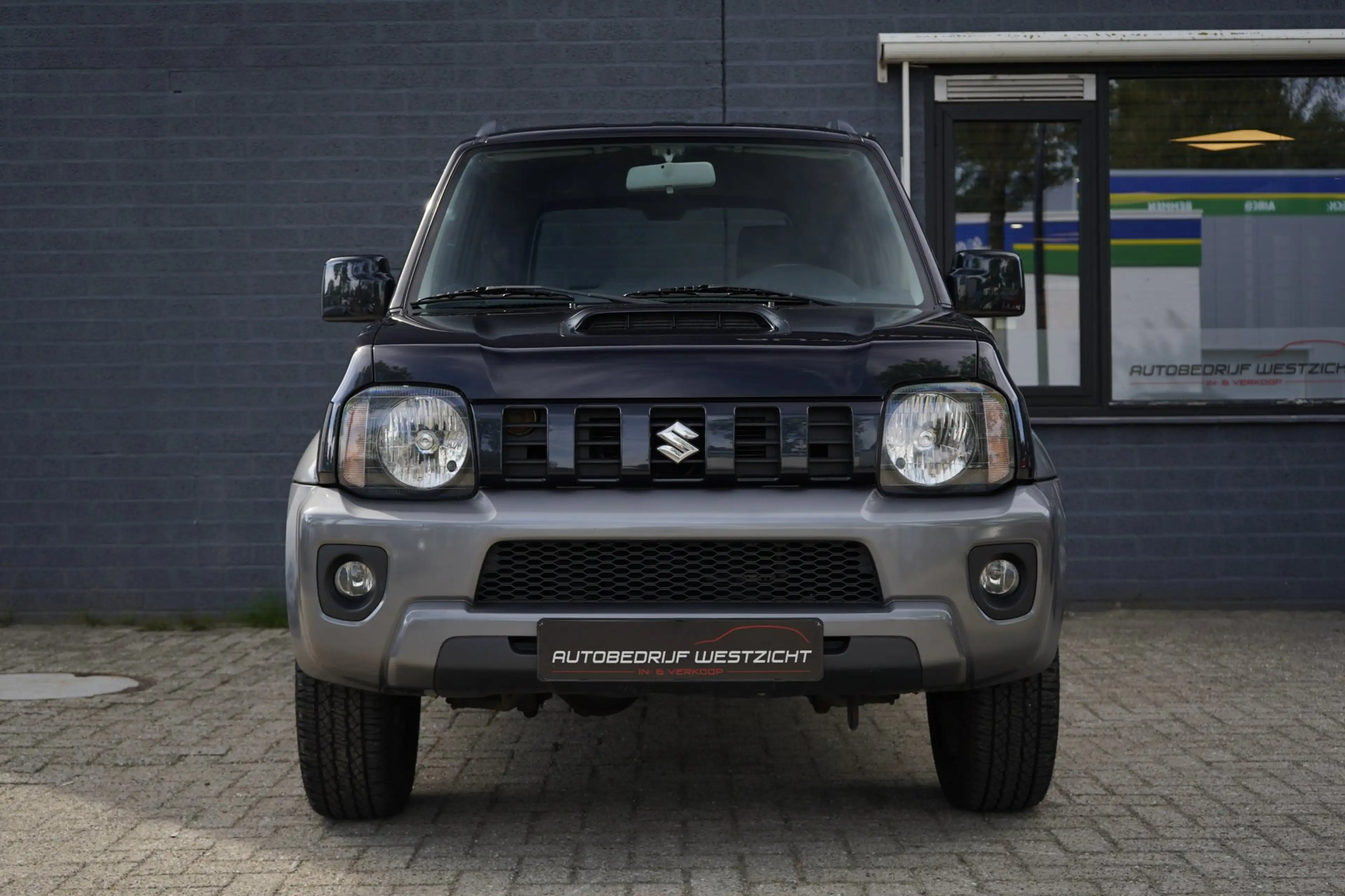 Suzuki Jimny 1.3 Exclusive 4WD, Leer, Airco, Stoelverwarming — photo 11