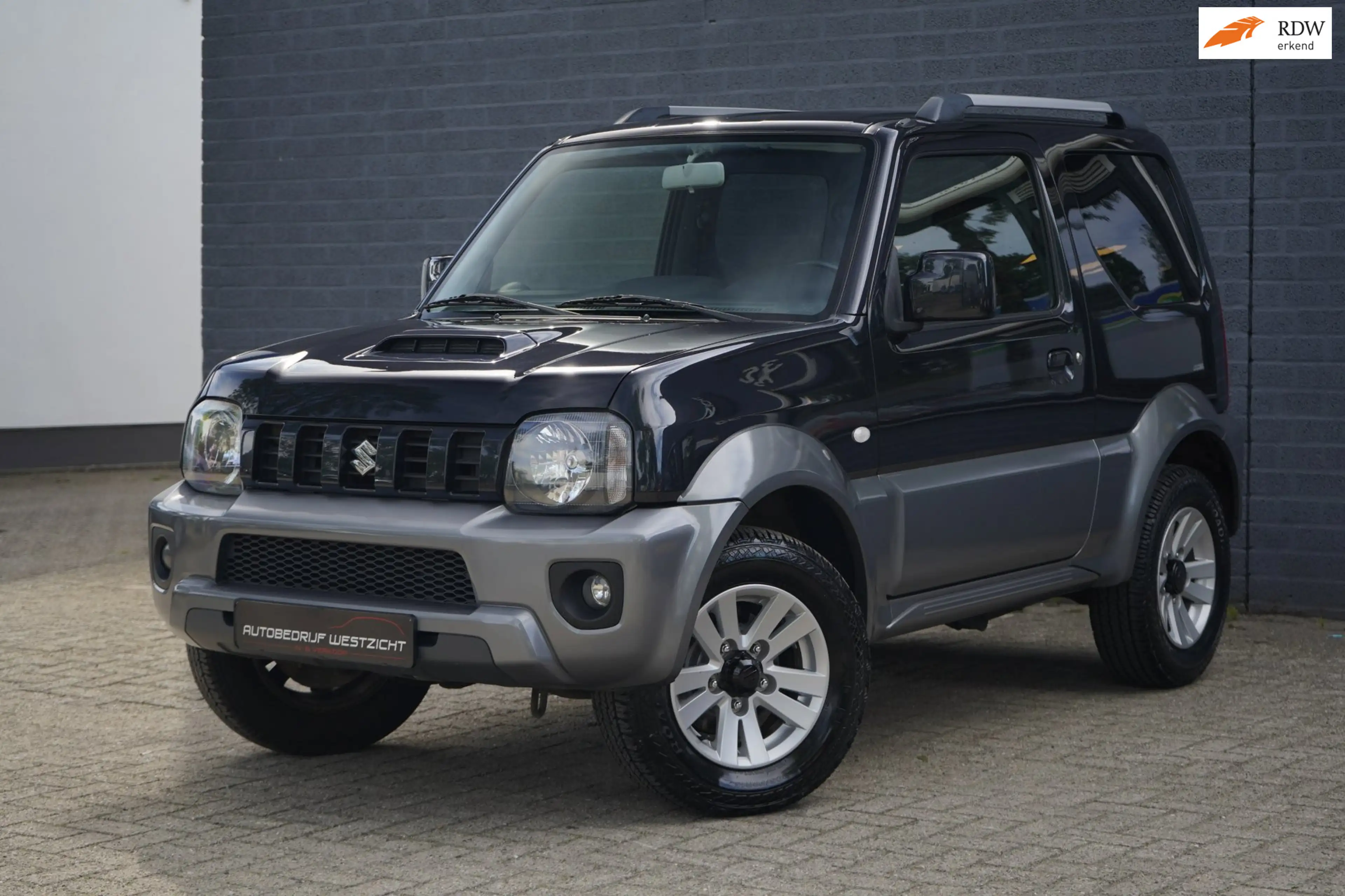 Suzuki Jimny 1.3 Exclusive 4WD, Leer, Airco, Stoelverwarming